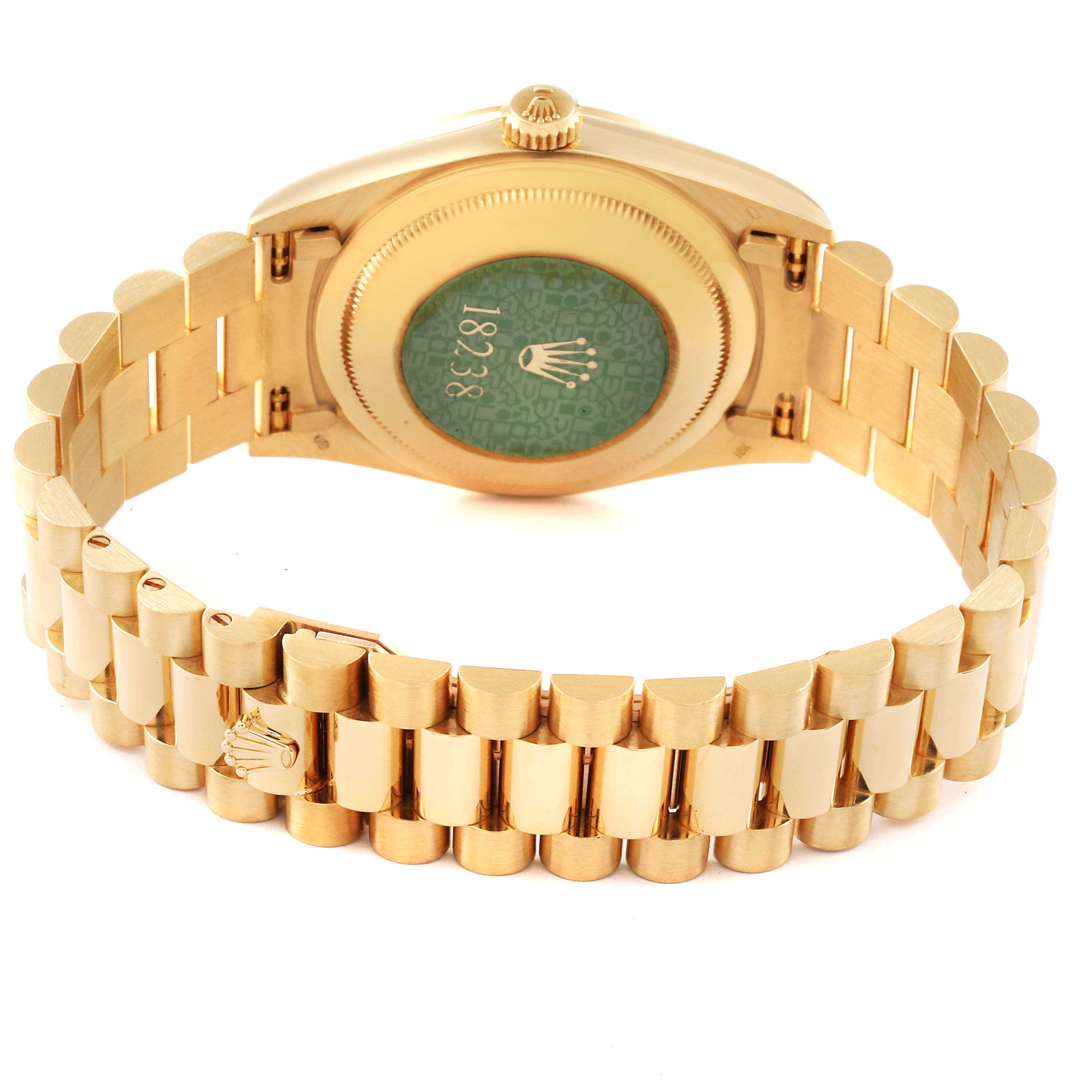 The image shows the back case, crown, and bracelet of a gold Rolex President 18238 Men
s Yellow Gold Champagne Dial 18238 Men
s Yellow Gold Champagne Dial model 18238 watch.