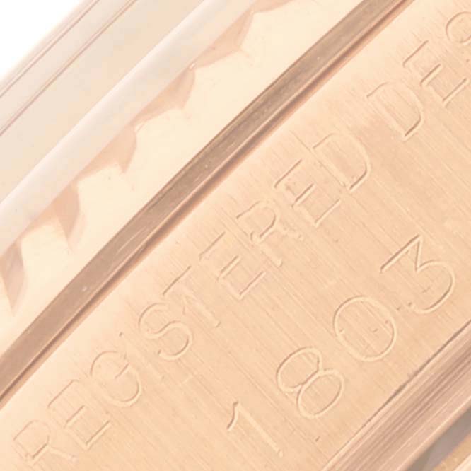 The image shows a close-up of the engraved side of a Rolex President 1803 Men's Rose Gold Silver Dial 1803 Men's Rose Gold Silver Dial model watch.
