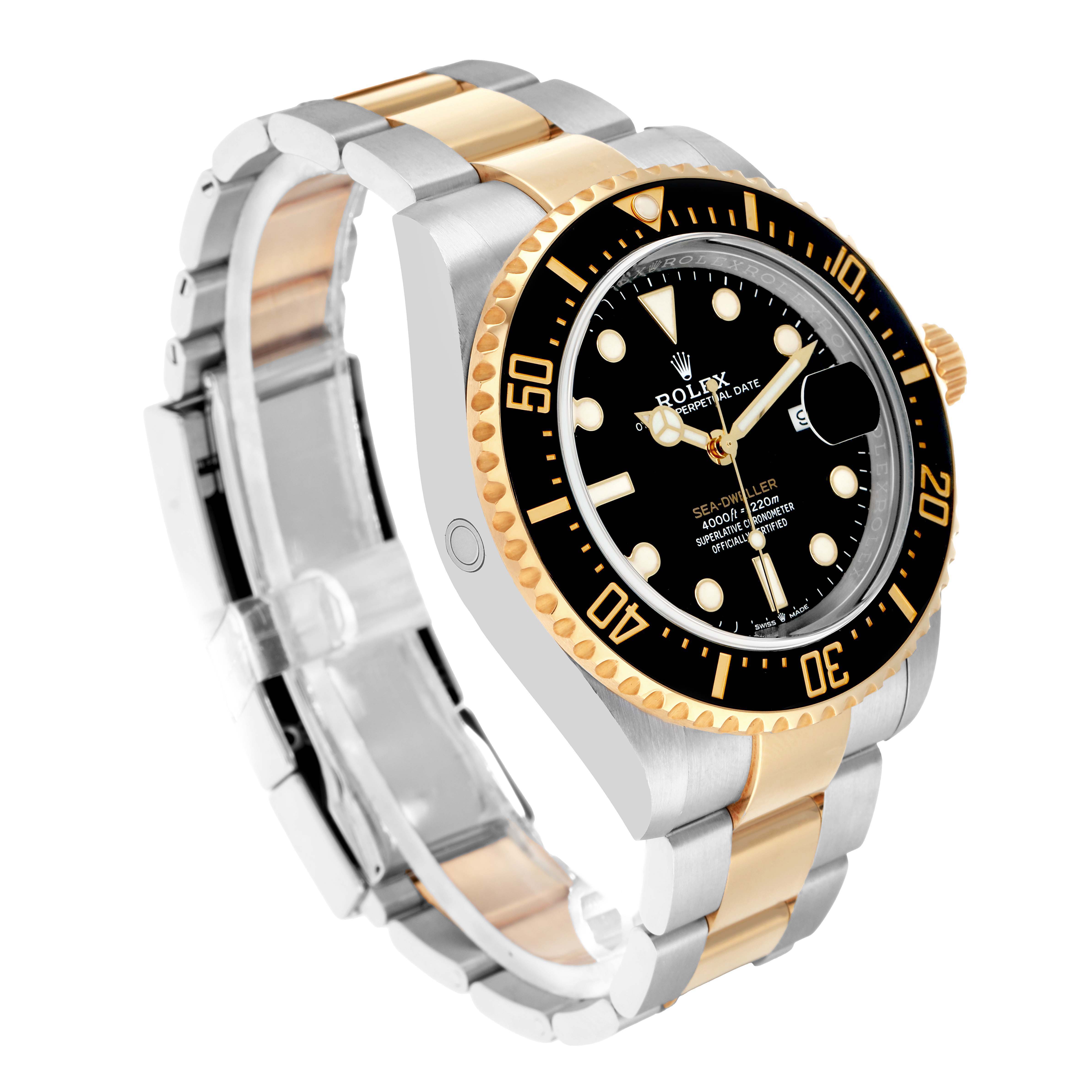 The Rolex Sea-Dweller 126603 Men
s Steel and Gold (two tone) Black Dial watch is shown at a three-quarter angle, displaying the face, bezel, crown, and part of the bracelet.