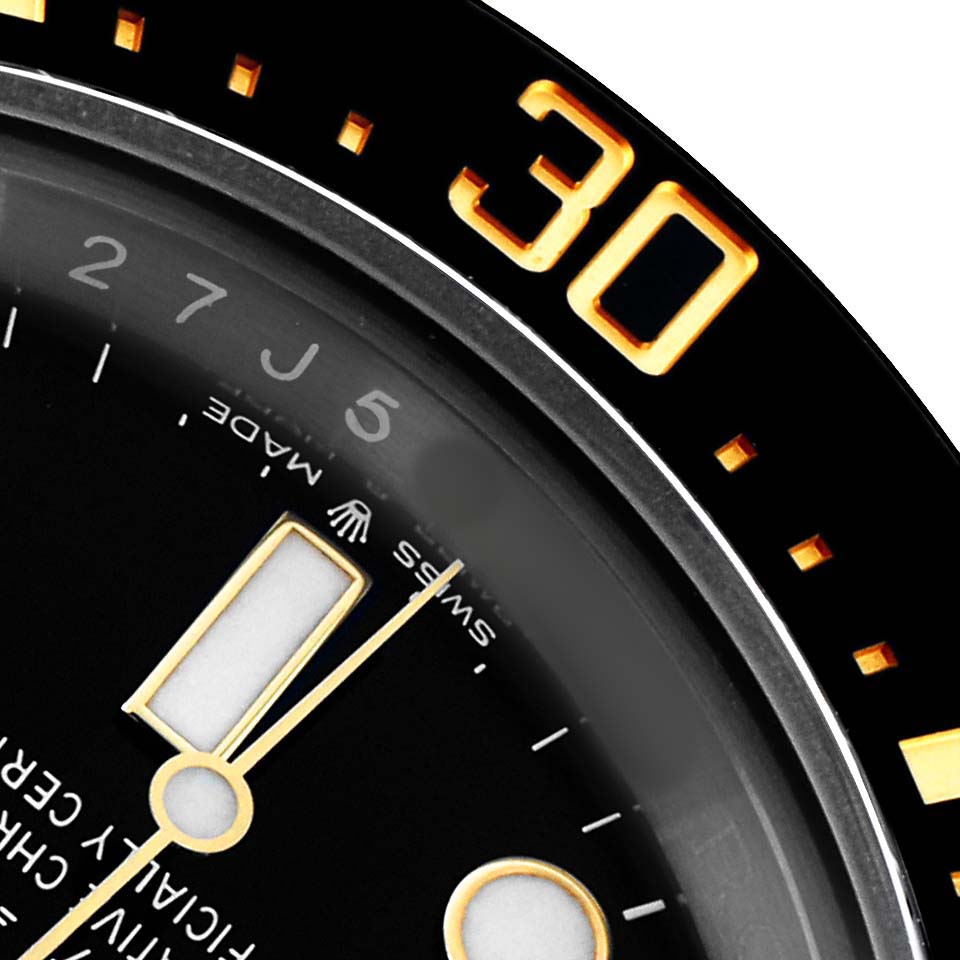The image shows a close-up of the Rolex Sea-Dweller 126603 Men
s Steel and Gold (two tone) Black Dial
s dial and bezel, highlighting the 30-minute mark.