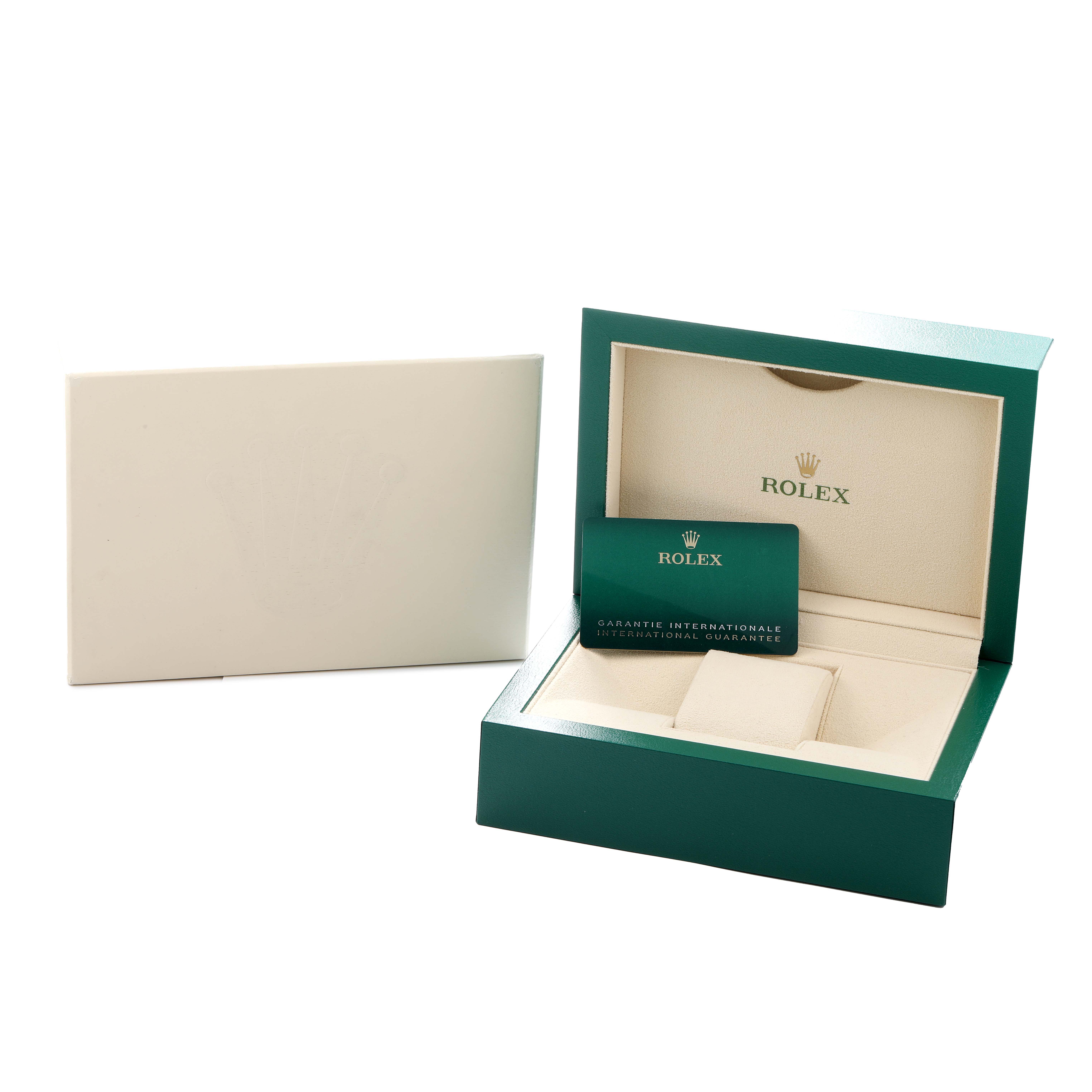 The image shows a Rolex Sea-Dweller 126603 Men
s Steel and Gold (two tone) Black Dial watch box, opened with an international guarantee card, viewed from a slight angle.