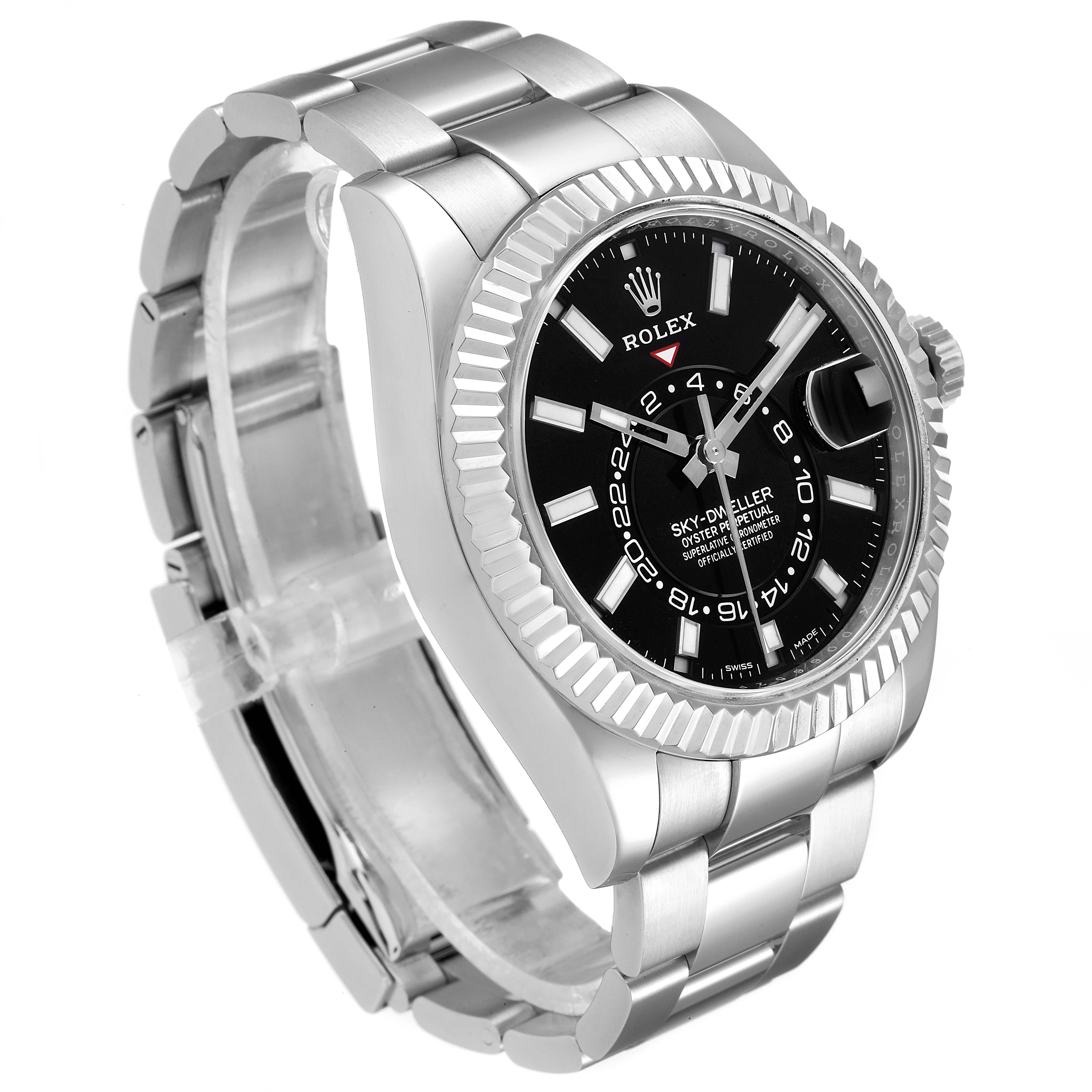 The Rolex Sky-Dweller 326934 Men's Stainless Steel Black Dial 326934 Men's Stainless Steel Black Dial watch is shown at an oblique angle, highlighting the black dial, fluted bezel, and metal bracelet.