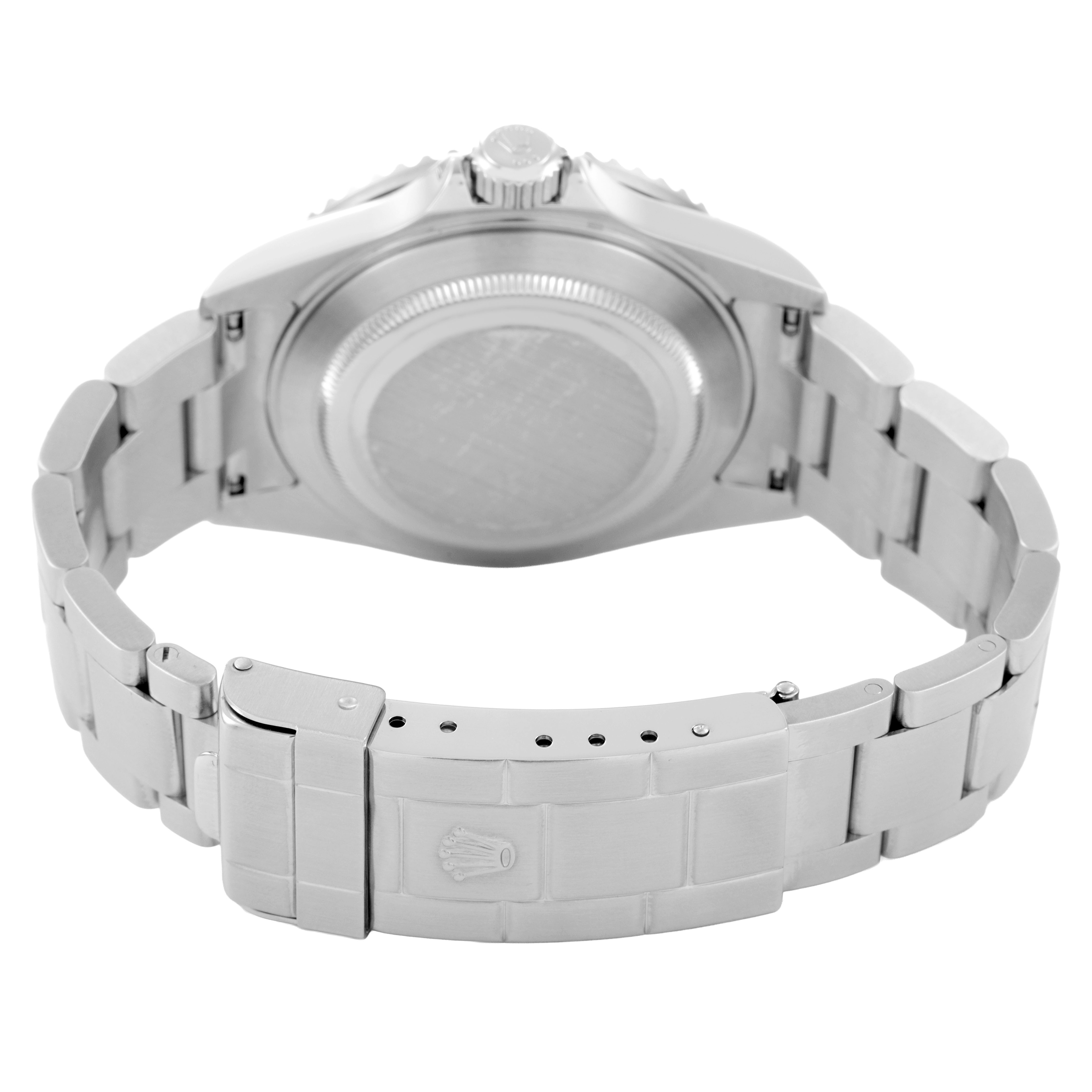 The image shows the back view of a Rolex Submariner 16610 Men's Stainless Steel Black Dial, highlighting its bracelet, clasp, and case back.