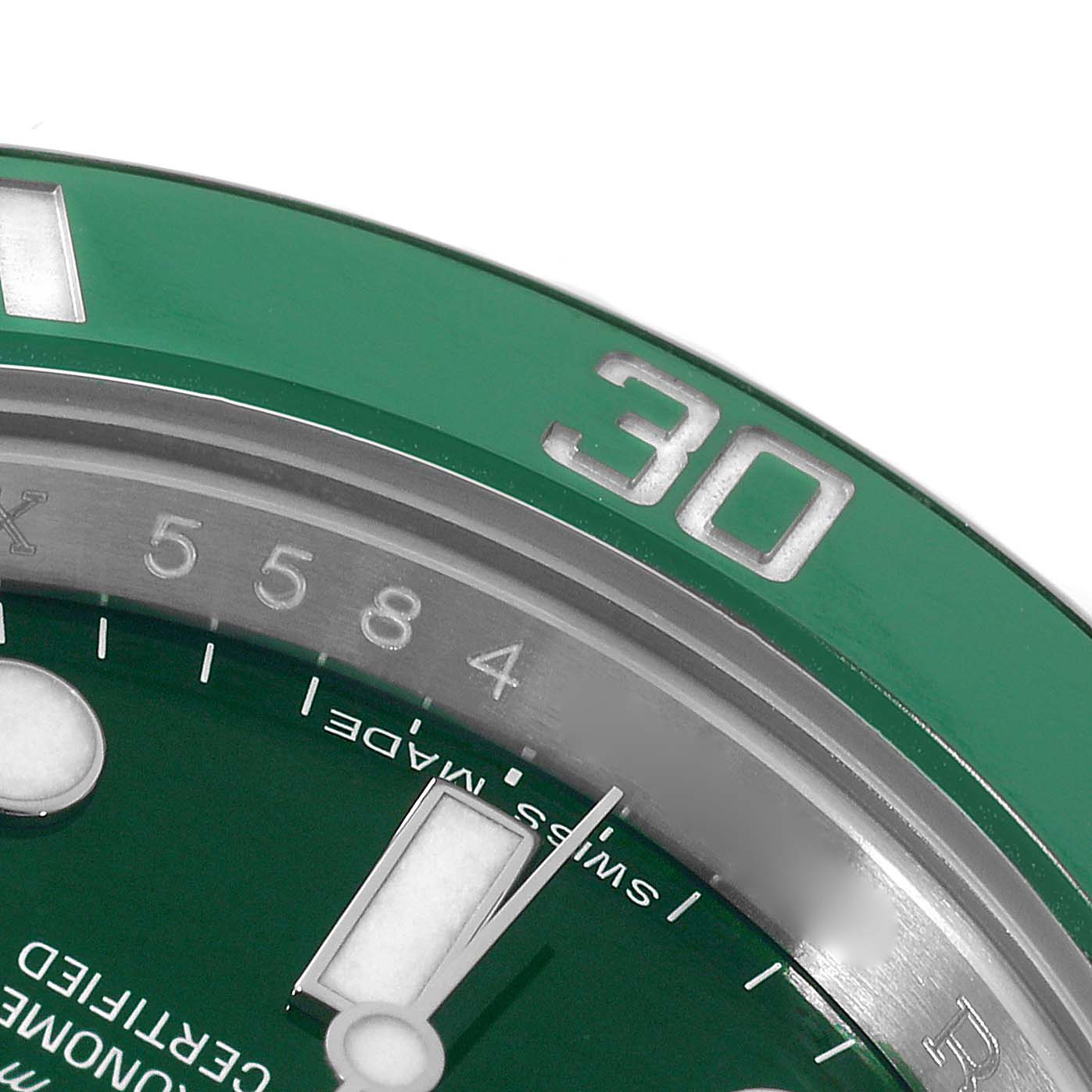 The image shows a close-up of the green bezel and part of the dial on a Rolex Submariner 116610LV Men
s Stainless Steel Green Dial 116610LV Men
s Stainless Steel Green Dial watch, focusing on the "30" mark.