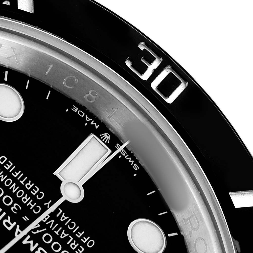 The image shows a close-up of the Rolex Submariner 126610 Men
s Stainless Steel Black Dial
s dial, bezel, and part of the minute hand, highlighting the "30" marker.