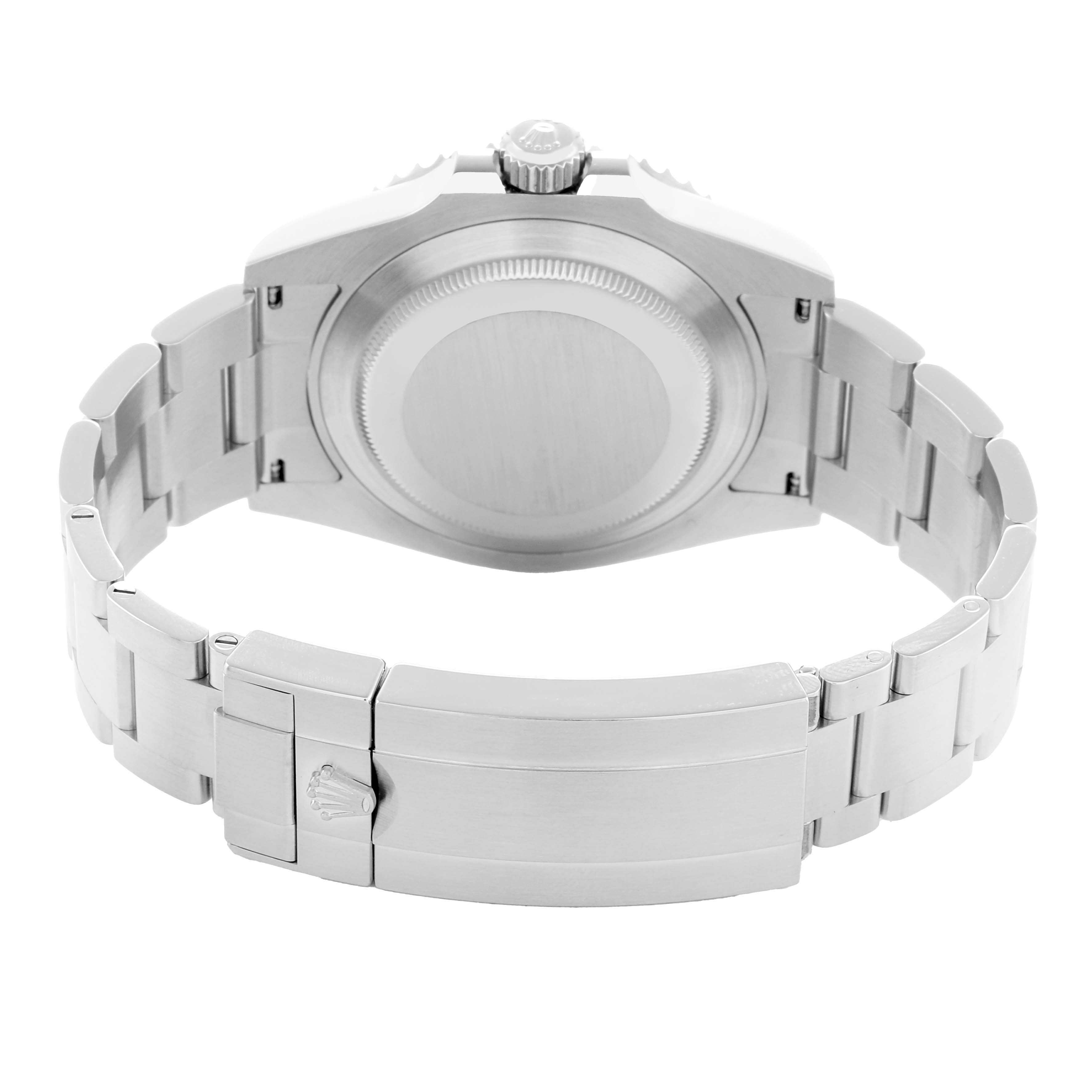 The image shows the back view of a Rolex Submariner 126610 Men
s Stainless Steel Black Dial, focusing on the case back and metal bracelet clasp.