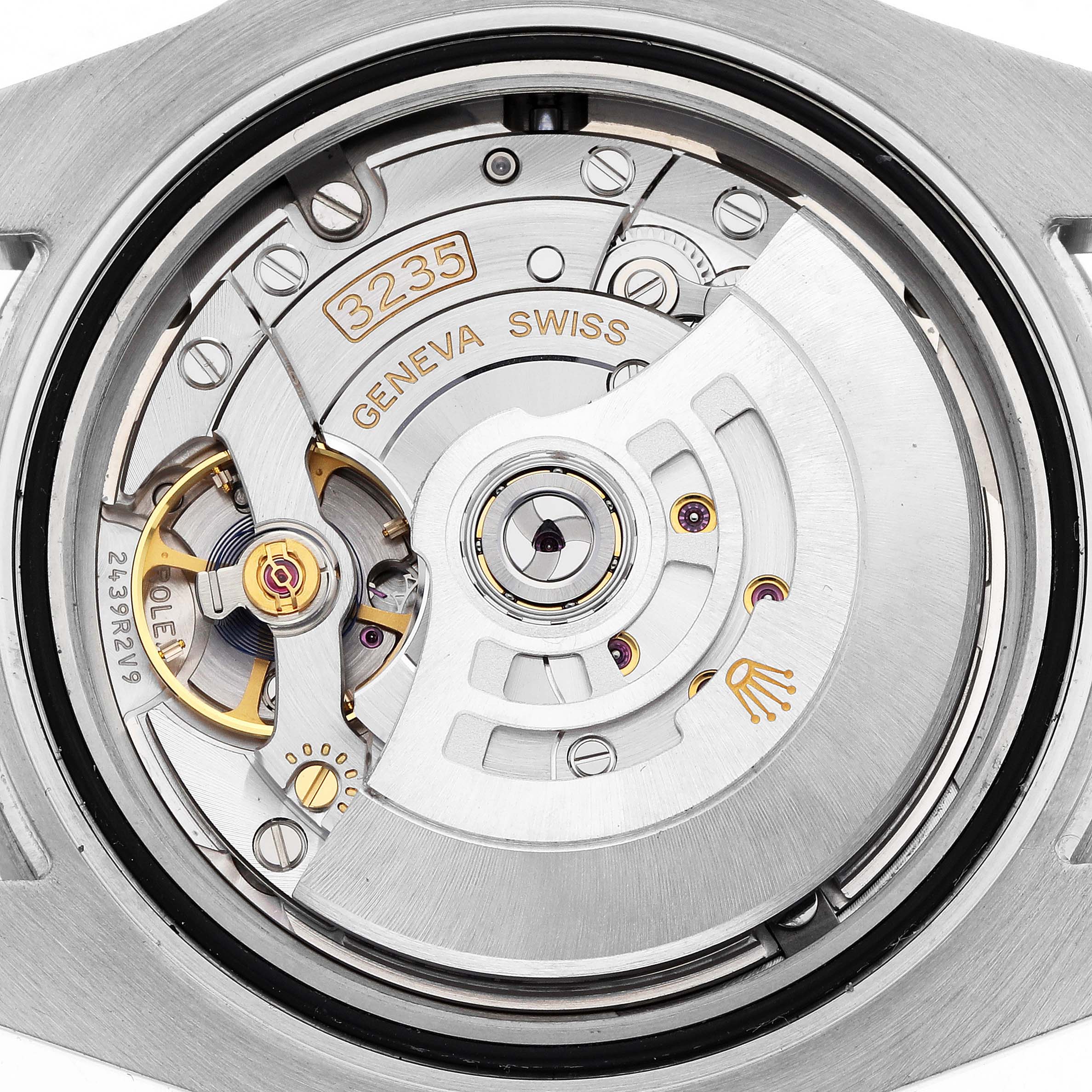 The image shows the movement from the back of a Rolex Submariner 126610 Men
s Stainless Steel Black Dial, highlighting its intricate mechanical components.