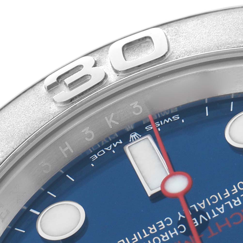 The image shows a close-up of the bezel, hour markers, and hand of a Rolex Yacht-Master 126622 Men
s Stainless Steel Blue Dial watch from a top angle.