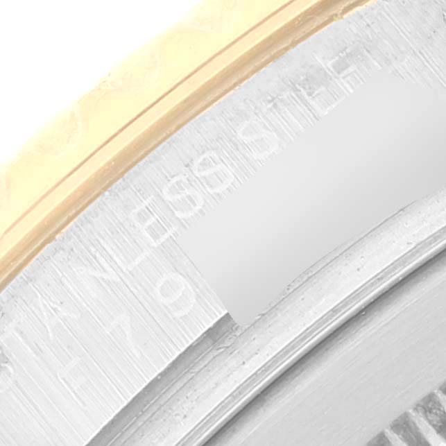 The image shows a close-up of the bezel and part of the case of a Rolex Yacht-Master 16623 Men's Steel and Gold (two tone) Grey Dial 16623 Men's Steel and Gold (two tone) Grey Dial watch.