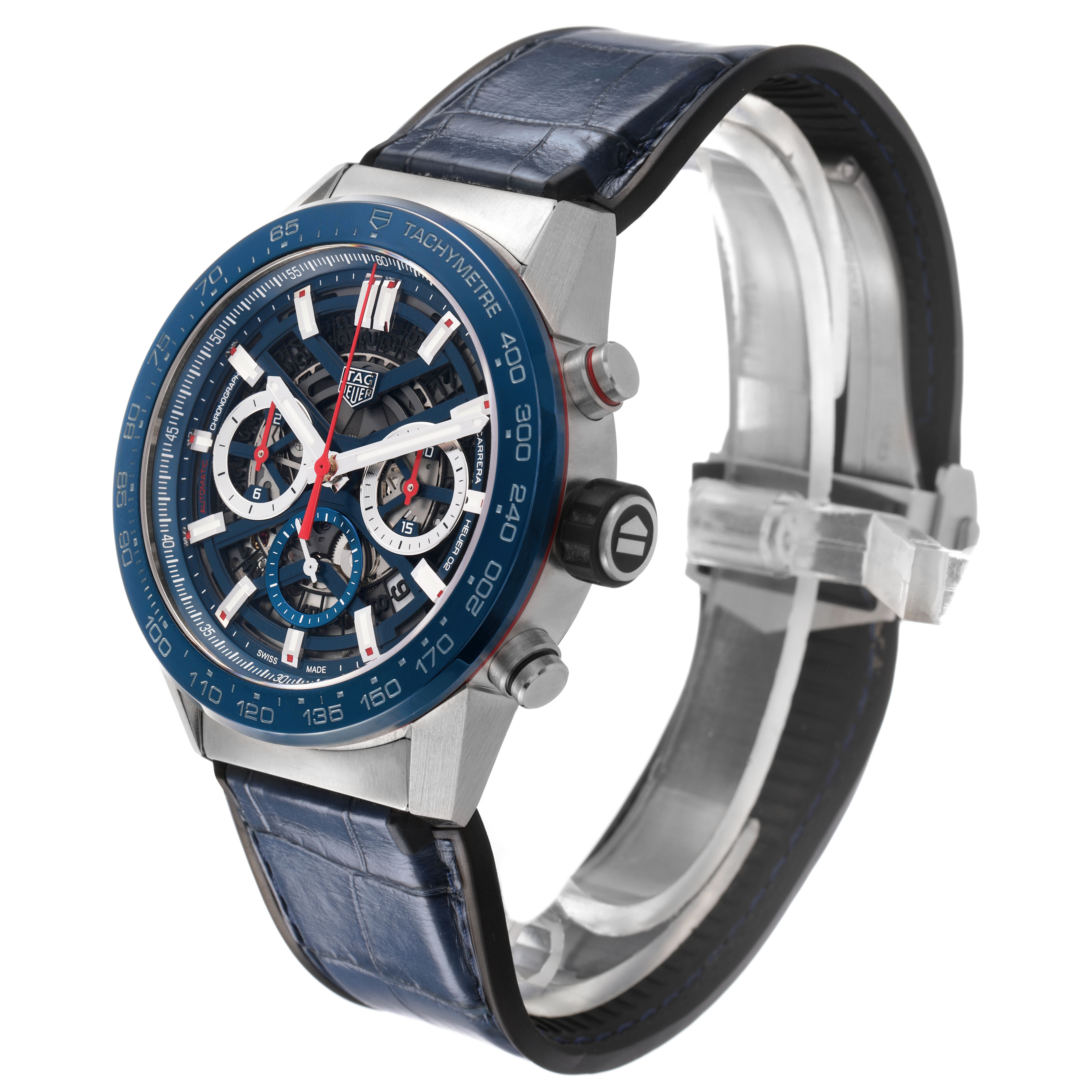 The Tag Heuer Carrera CBG2A11.FC6460 Men's Stainless Steel Blue Dial watch is shown at a three-quarter angle, highlighting the face, bezel, strap, and pushers.