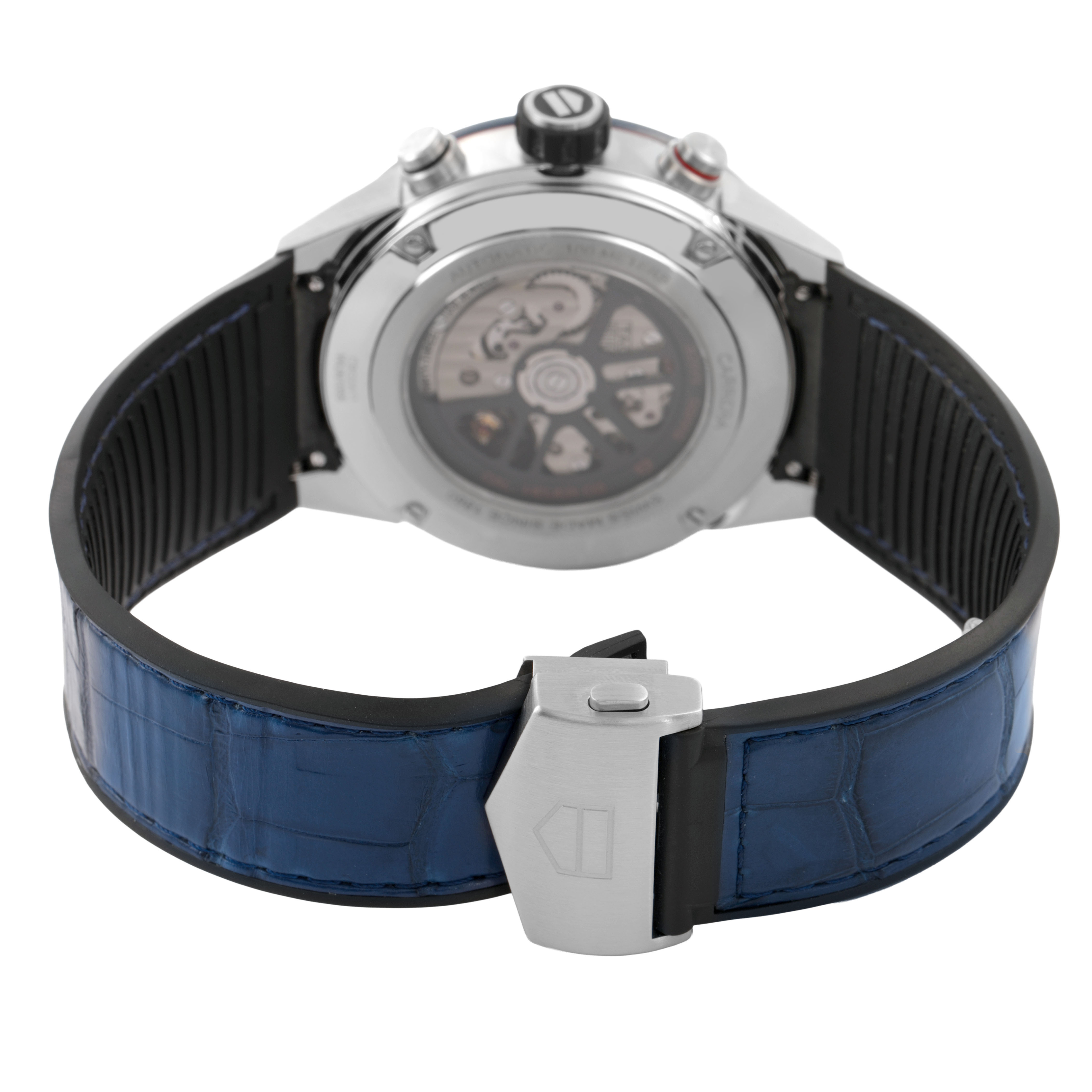 The image shows the rear view of a Tag Heuer Carrera CBG2A11.FC6460 Men's Stainless Steel Blue Dial watch, highlighting its clasp, case back, and visible movement.
