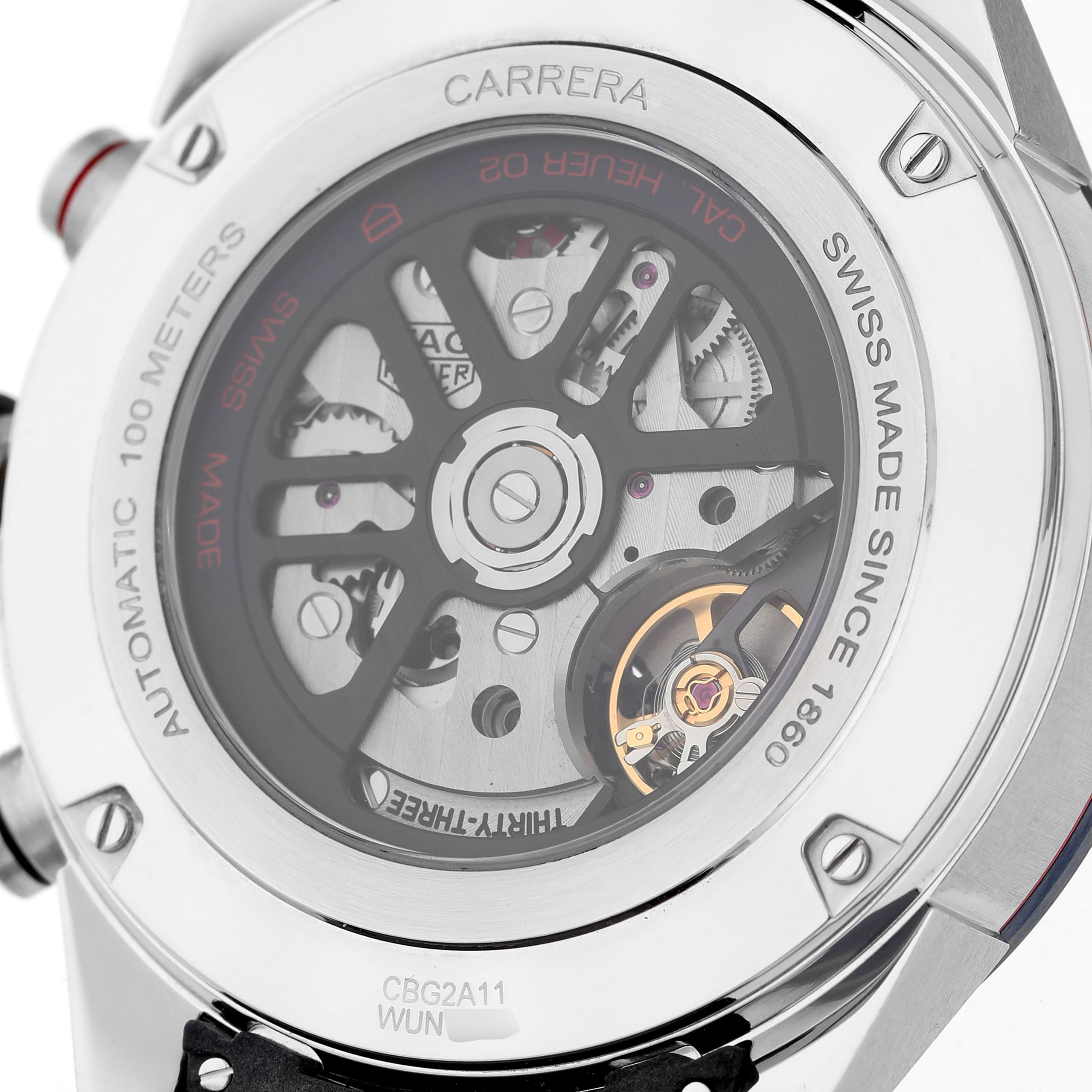 The image shows the back of a Tag Heuer Carrera CBG2A11.FC6460 Men's Stainless Steel Blue Dial watch, highlighting its automatic movement.