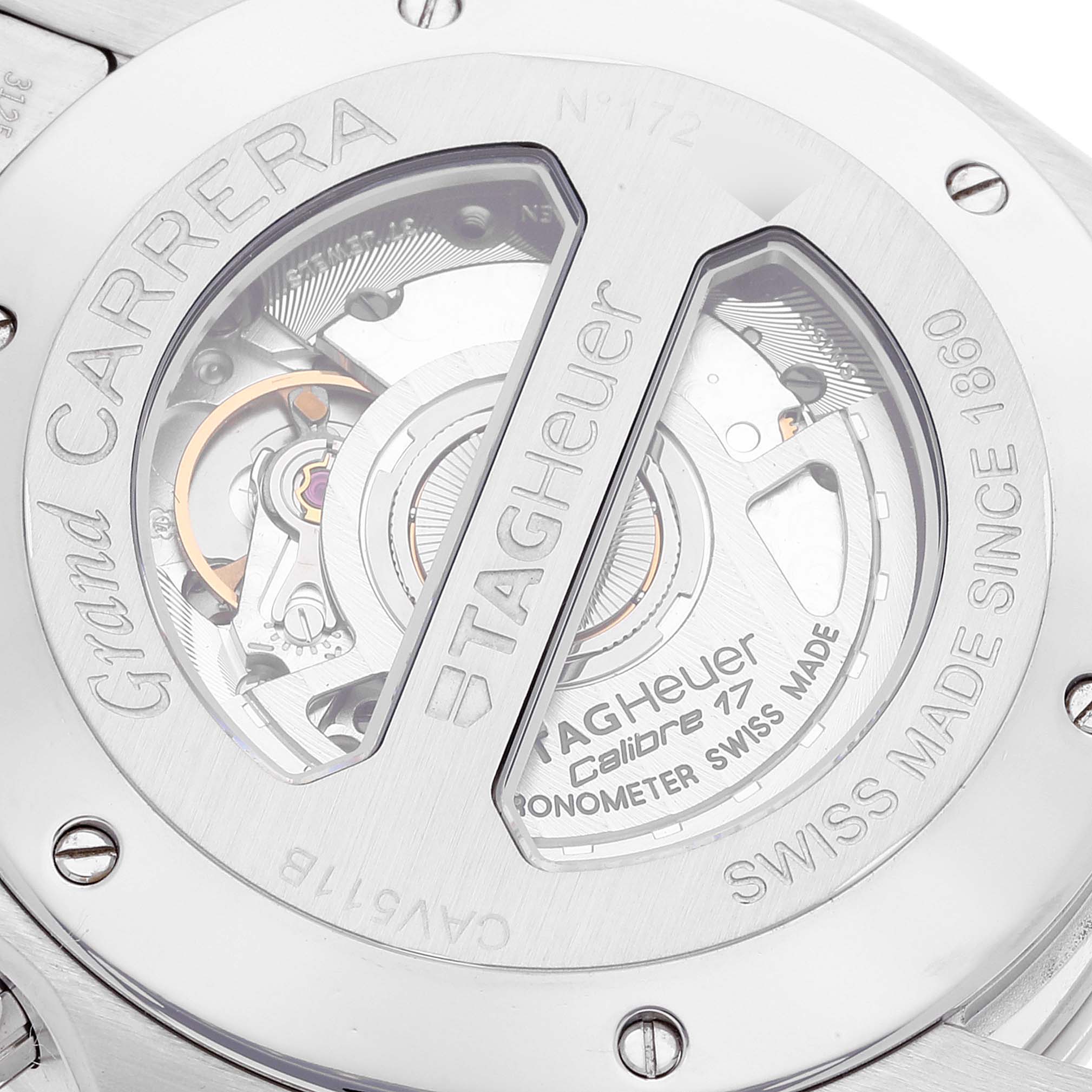 This image shows the back side of a Tag Heuer Carrera CAV511B.BA0902 Men's Stainless Steel Silver Dial CAV511B.BA0902 Men's Stainless Steel Silver Dial watch, highlighting the exposed movement mechanism and "Calibre 17" marking.