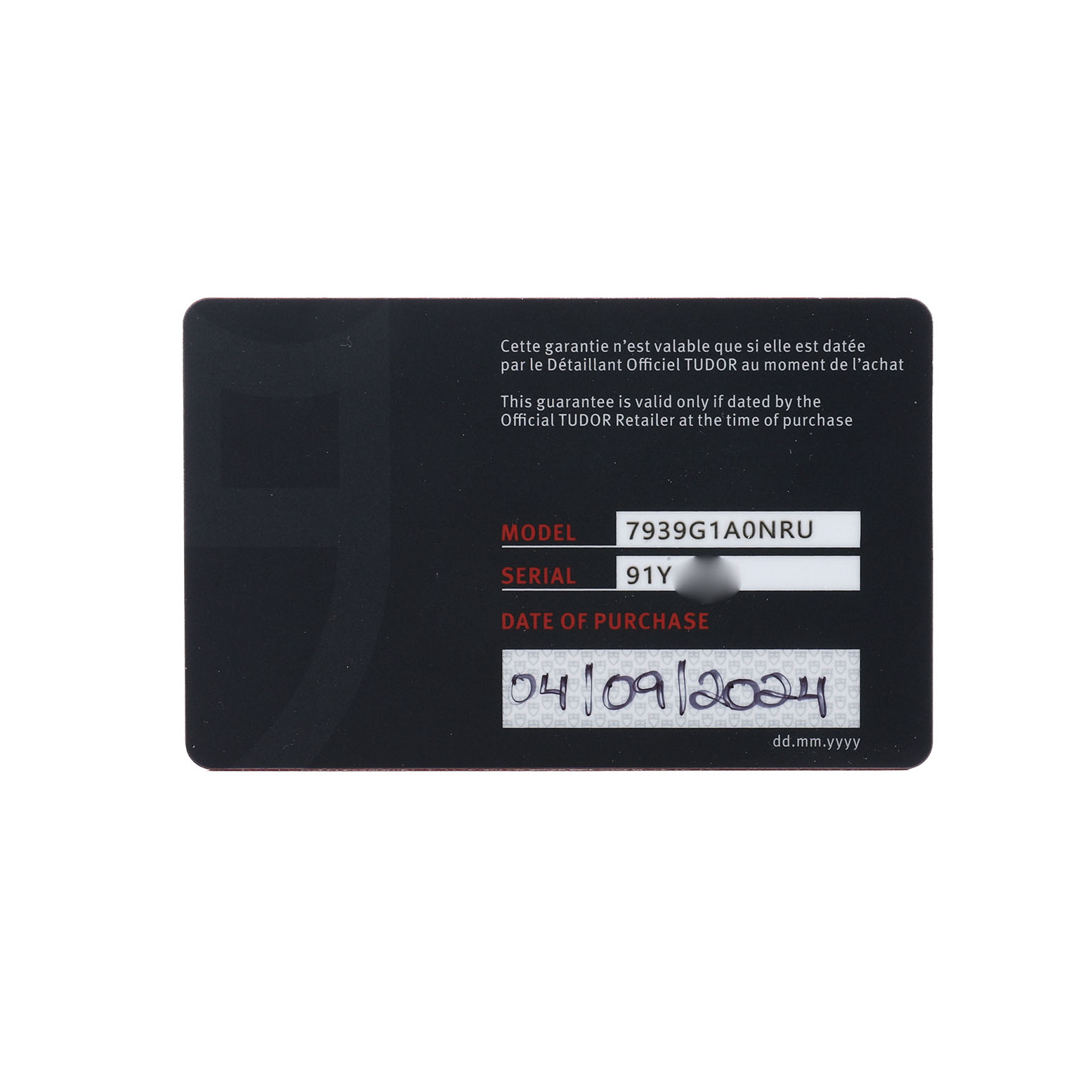 The image shows a warranty card for the Tudor Heritage Black Bay 7939G Men's Stainless Steel Black Dial model, displaying model, serial number, and purchase date.