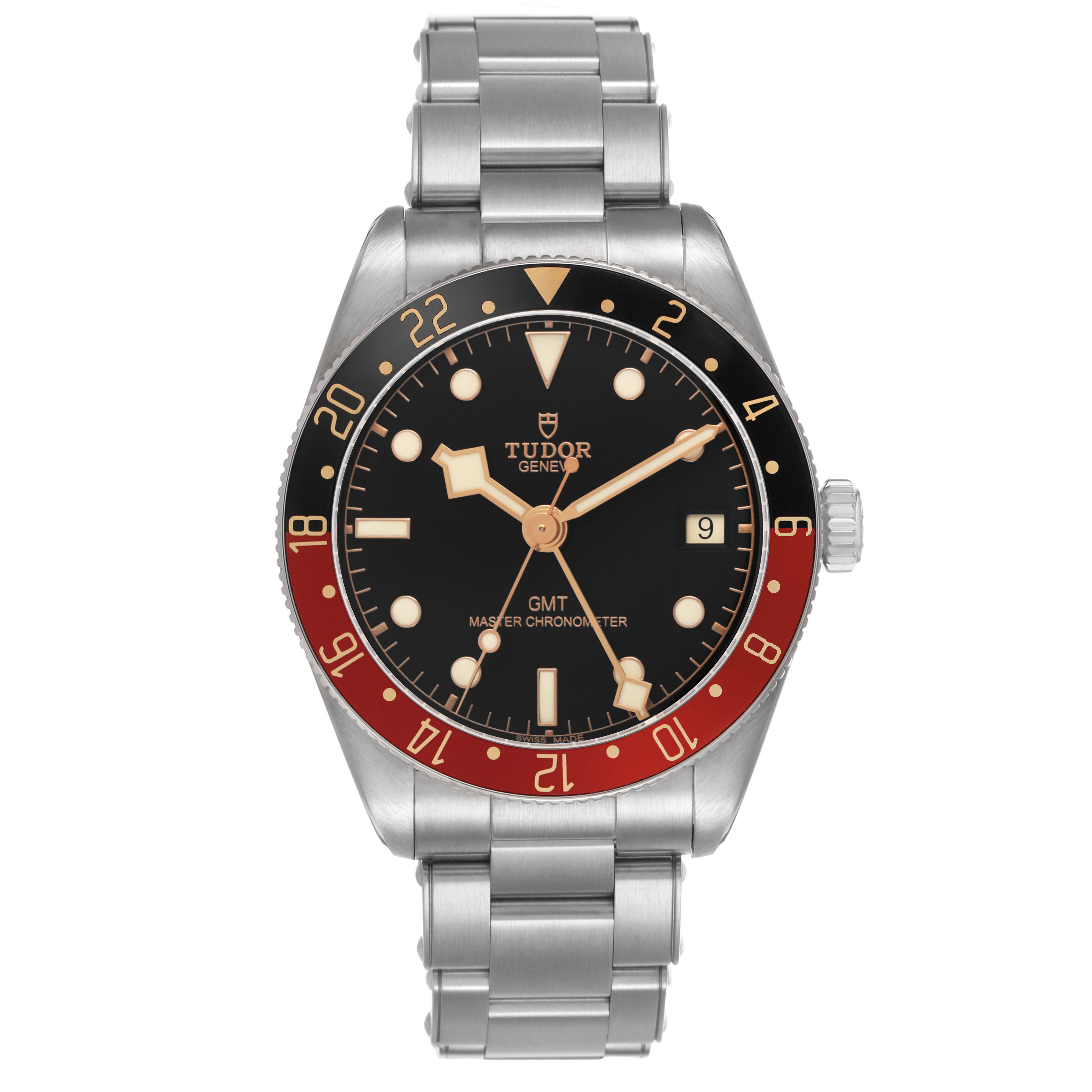 The Tudor Heritage Black Bay 7939G Men's Stainless Steel Black Dial watch is shown front-facing, displaying the dial, bezel, crown, and bracelet.