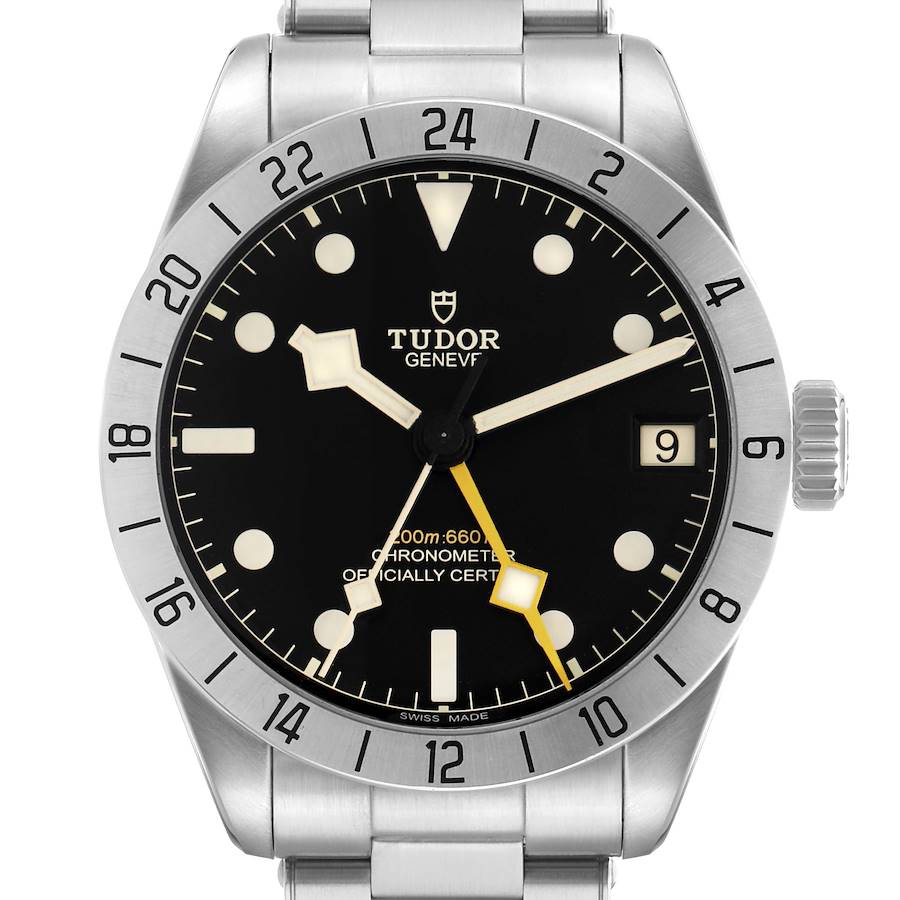The Tudor Heritage Black Bay 79470 Men's Stainless Steel Black Dial watch is shown from the front, displaying the bezel, dial, hands, crown, and part of the bracelet.