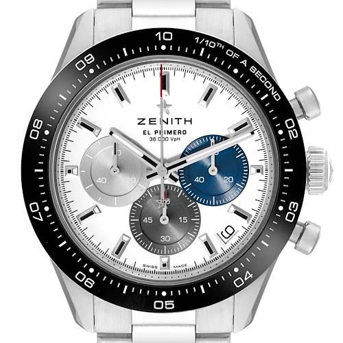 The Zenith Chronomaster watch is shown from a frontal angle, highlighting the face and bezel.