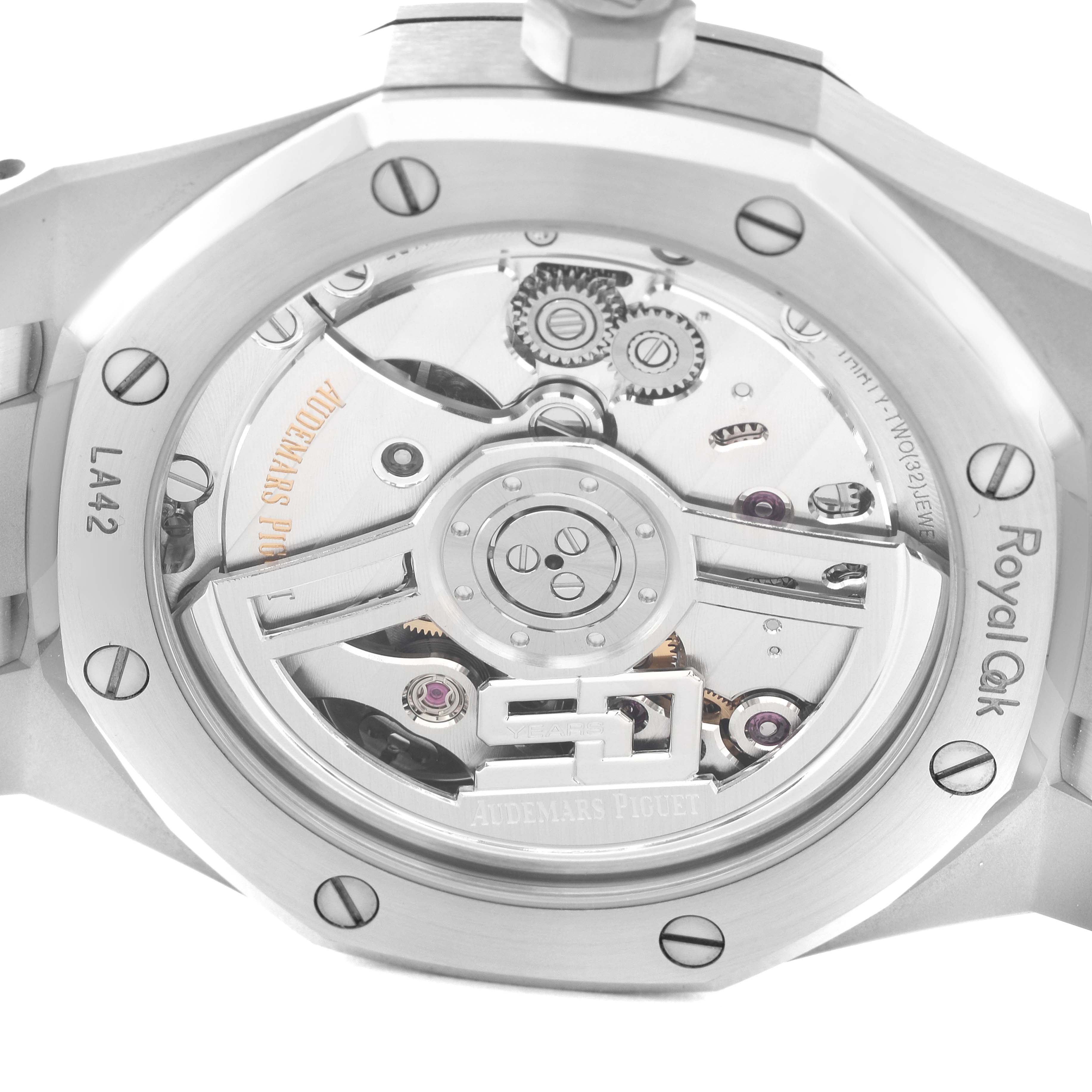 The image shows the back view of the Audemars Piguet Royal Oak 15510ST.OO.1320ST.03 Men's Stainless Steel Silver Dial 15510ST.OO.1320ST.03 Men's Stainless Steel Silver Dial watch, highlighting the intricate internal mechanics and gears.