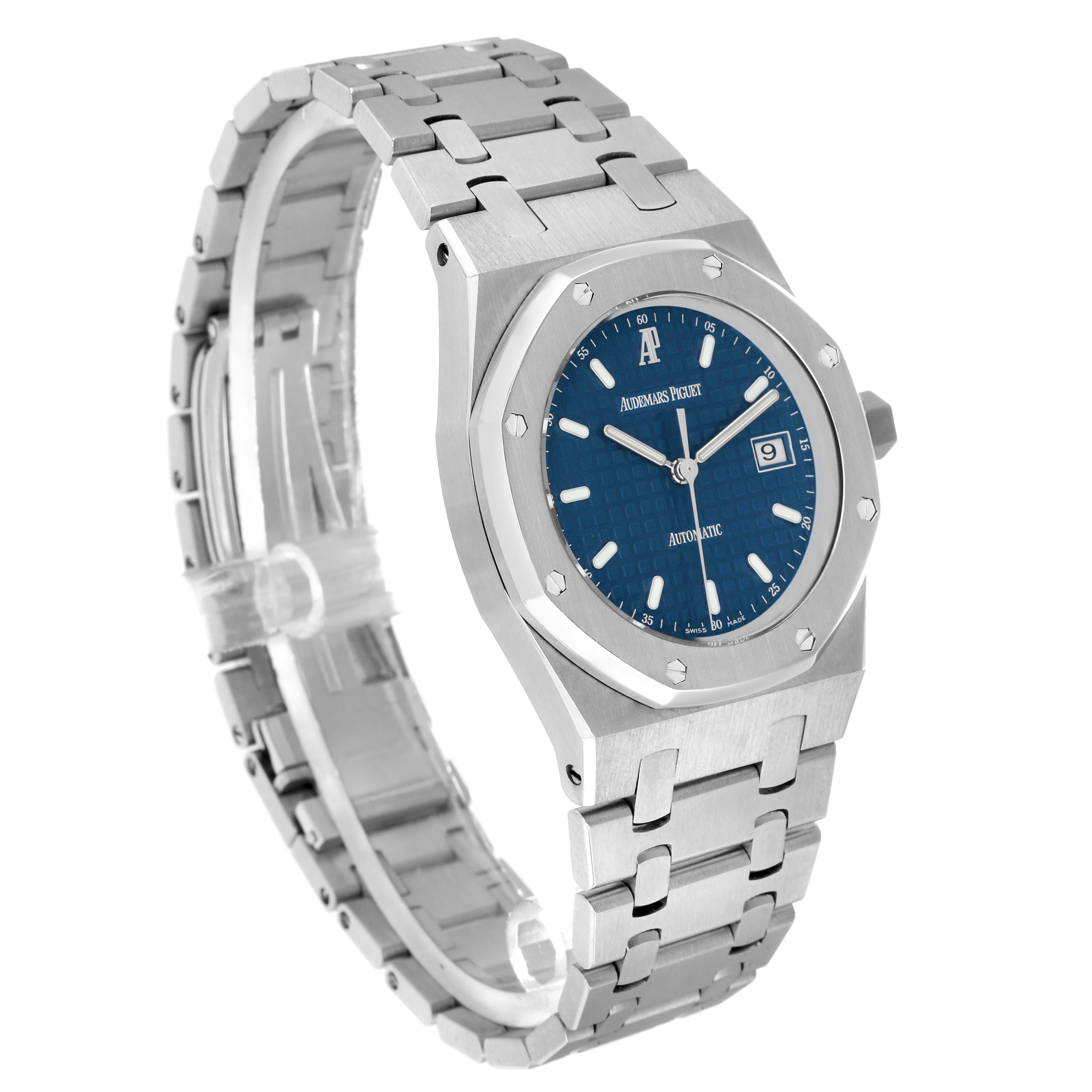 The Audemars Piguet Royal Oak 15000ST.OO.0789ST.05 Men
s Stainless Steel Blue Dial watch is shown from a front-left angle, highlighting the face, bezel, and full metal bracelet.