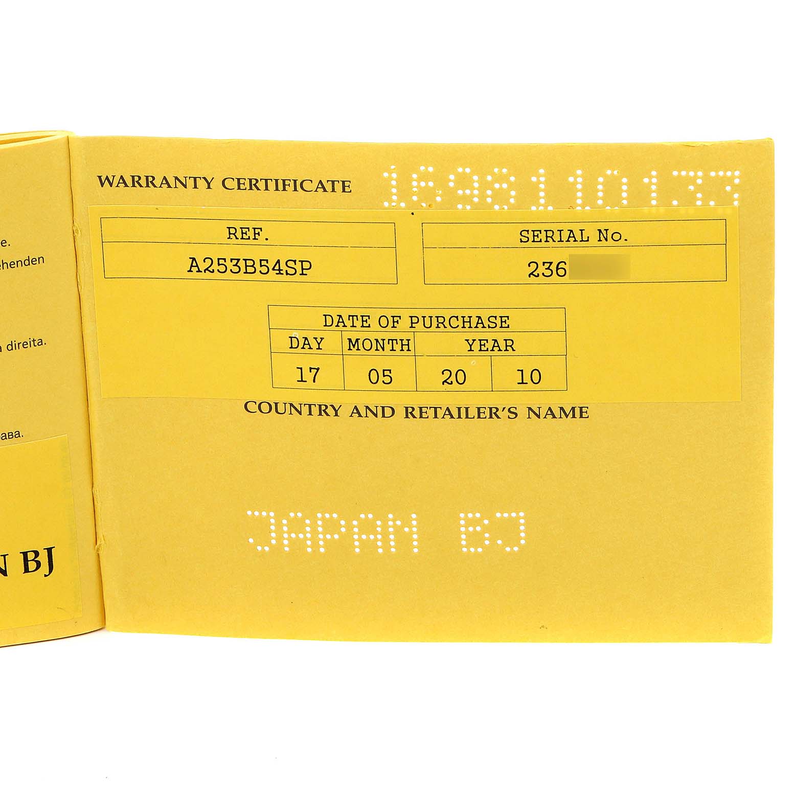 The image shows the warranty certificate for a Bentley model by Breitling, displaying reference number, serial number, and purchase date.