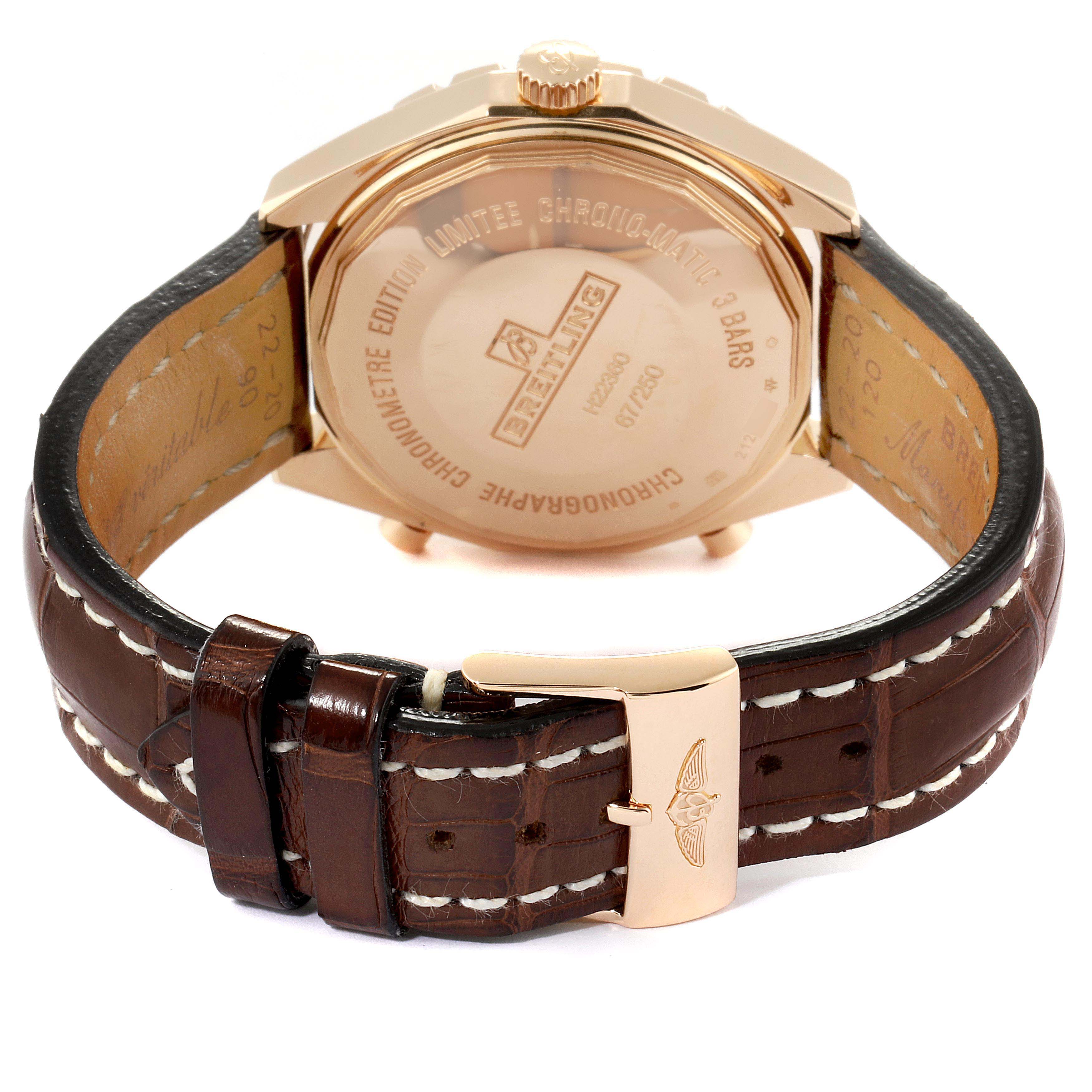 This image shows the back of a Breitling Chronomatic H22360 Men's Rose Gold Black Dial H22360 Men's Rose Gold Black Dial watch and its brown leather strap with white stitching.