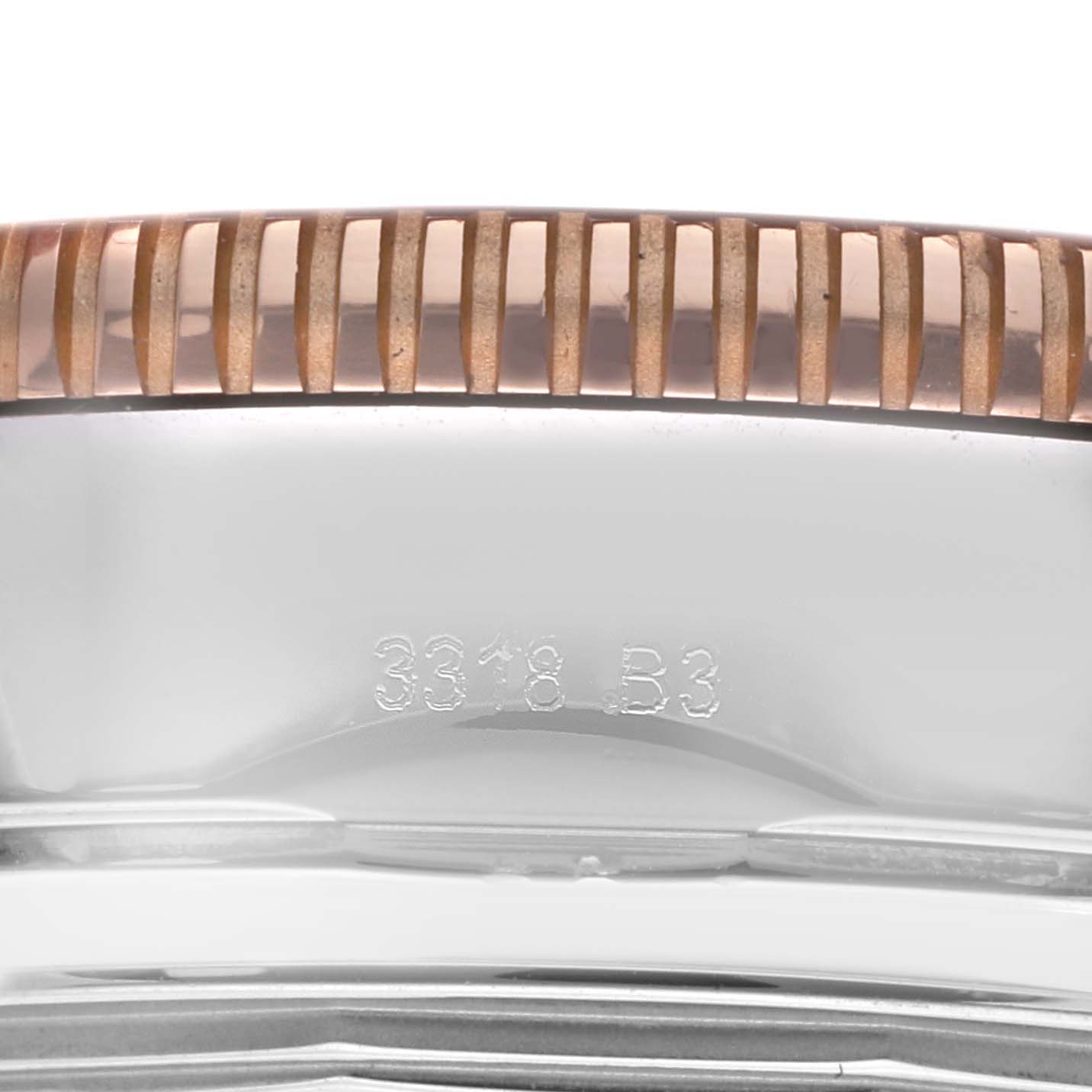The image shows a close-up side view of the bezel and edge of the case of a Breitling Superocean U13313 Men
s Stainless Steel Black Dial watch.