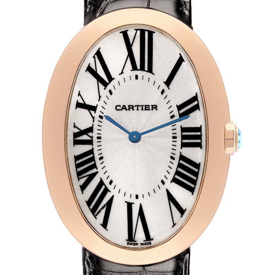 The Cartier Baignoire W852000002 Women's Rose Gold Silver Dial watch is shown from a front angle, displaying the oval case, Roman numeral dial, blue hands, and crown detail.