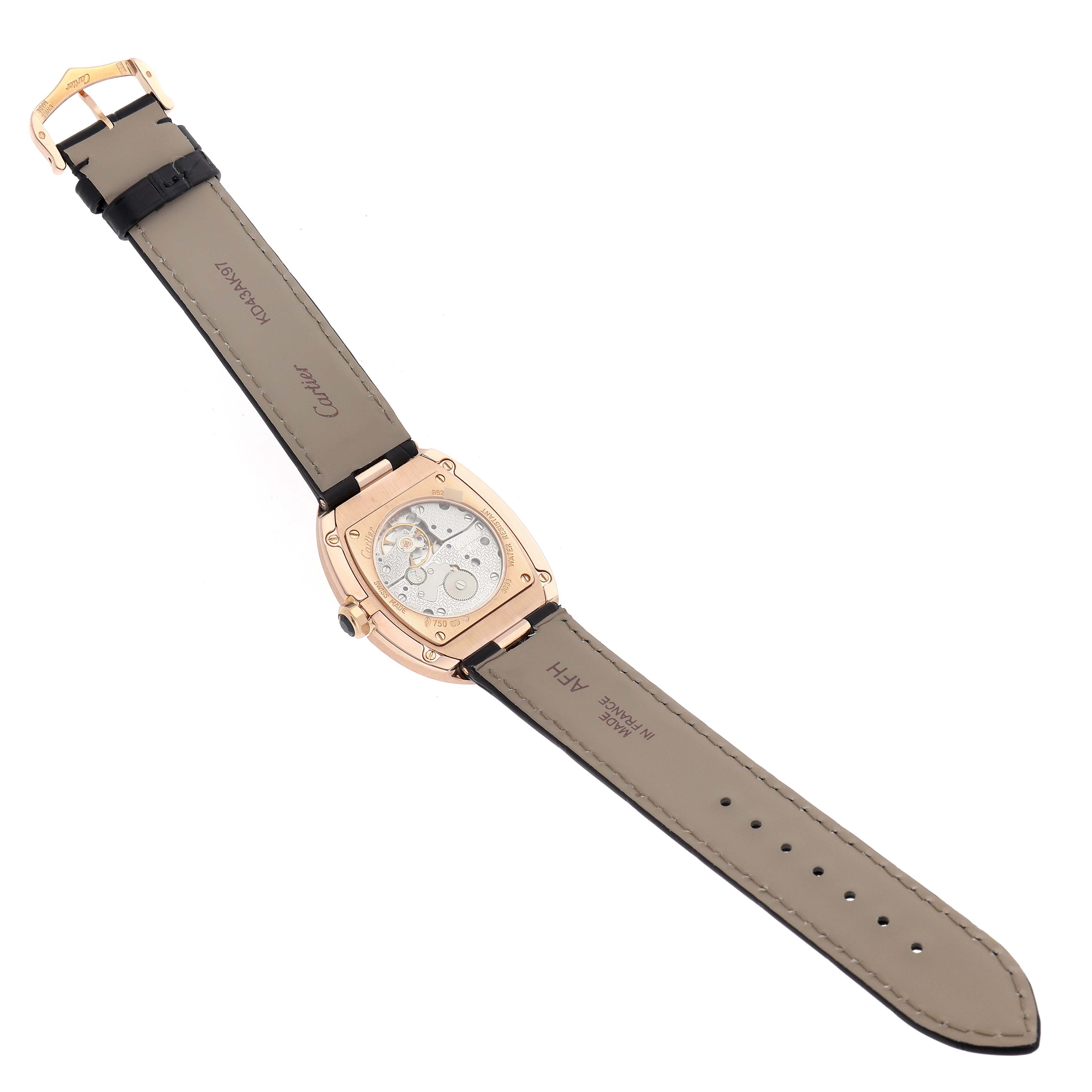 The Cartier Baignoire W852000002 Women
s Rose Gold Silver Dial watch is shown from the back, detailing the movement and the leather strap.