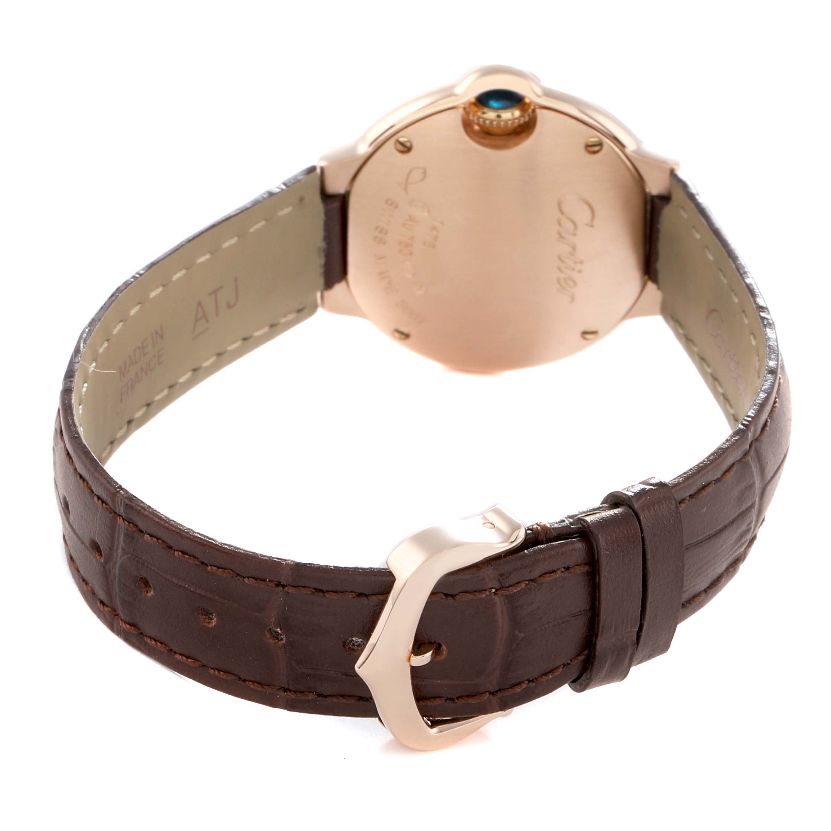 The image shows the back of the Cartier Ballon Bleu W6900256 Women's Rose Gold Silver Dial watch, highlighting the case back, crown, and leather strap with a buckle.