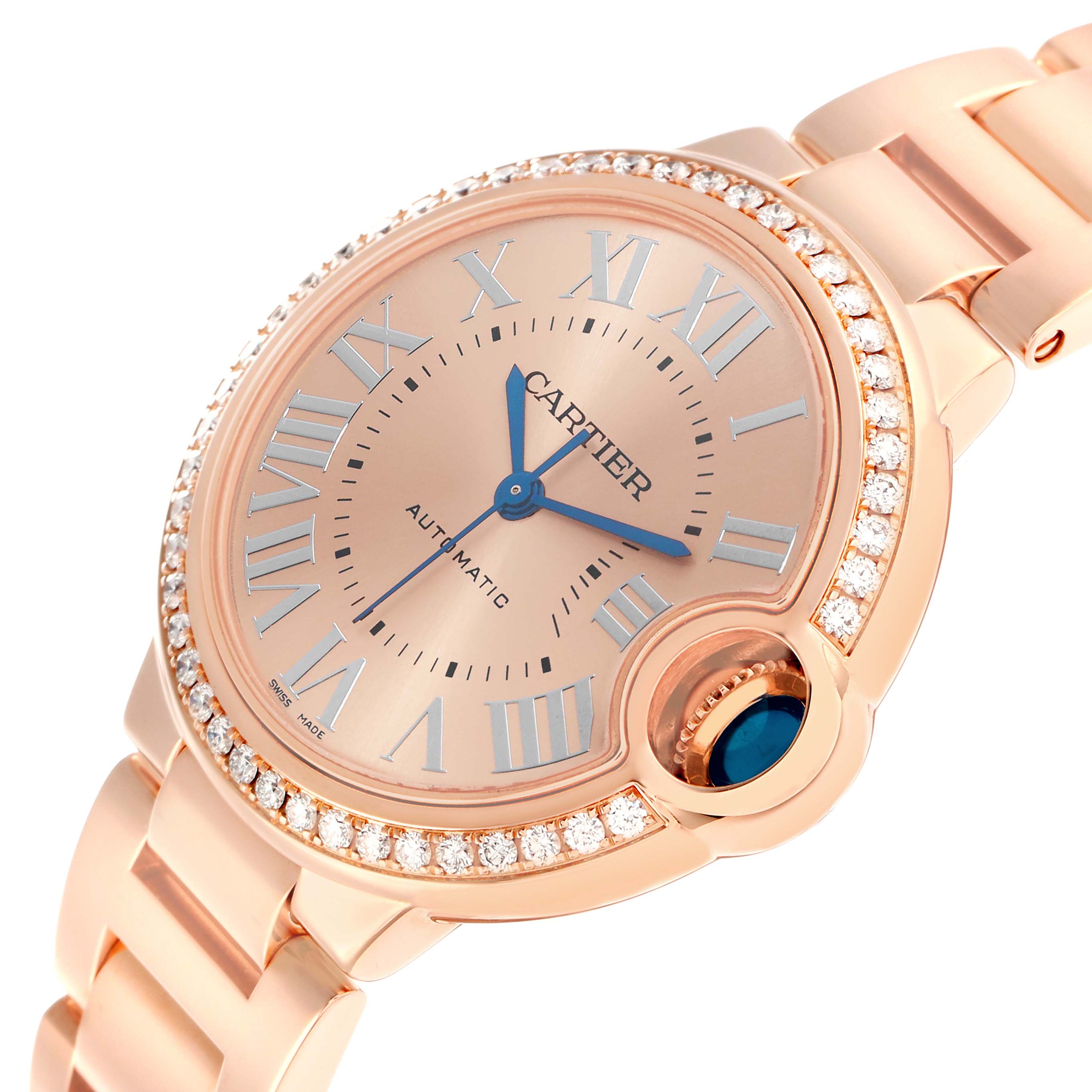 The Cartier Ballon Bleu WJBB0077 Women's Rose Gold Pink Dial watch is shown at an angled close-up, highlighting the face, blue hands, Roman numerals, and bejeweled bezel.