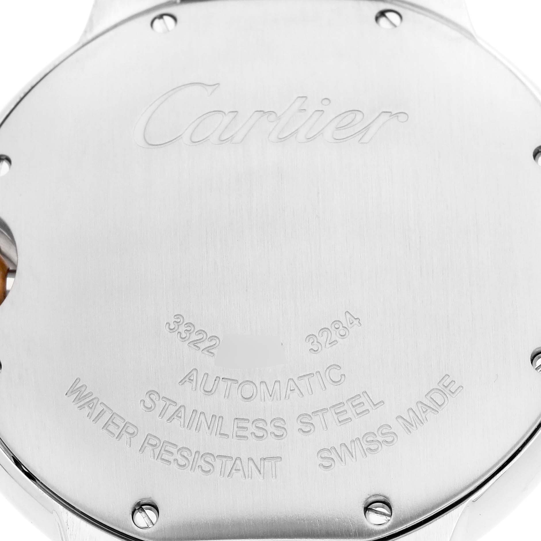 The image shows the back case of a Cartier Ballon Bleu WE902054 Women's Steel and Gold (two tone) Pink Dial watch, featuring engraved details about its specifications.
