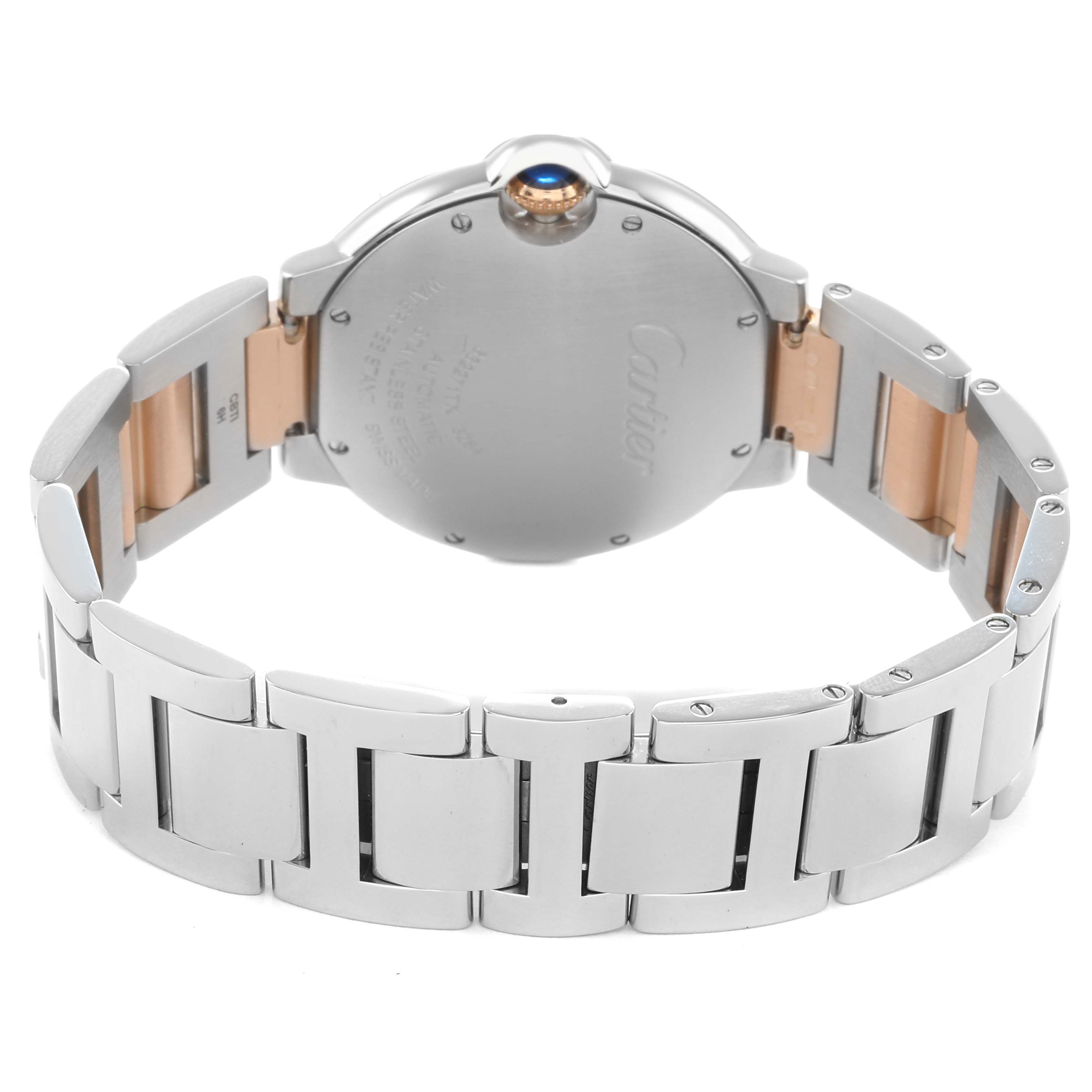 The image shows the back view of the Cartier Ballon Bleu WE902054 Women's Steel and Gold (two tone) Pink Dial watch, highlighting the bracelet and case back.