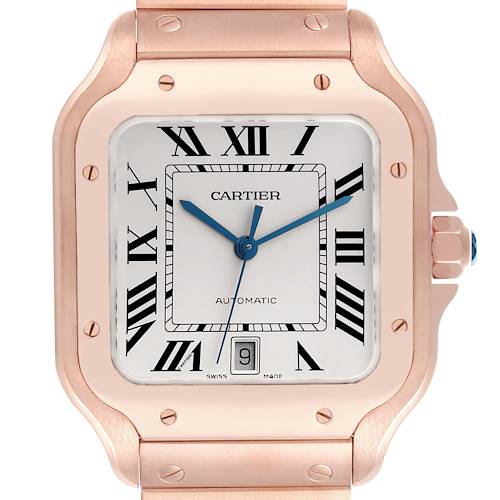 The Cartier Santos watch is shown in a close-up frontal angle, highlighting the face, case, and part of the bracelet.