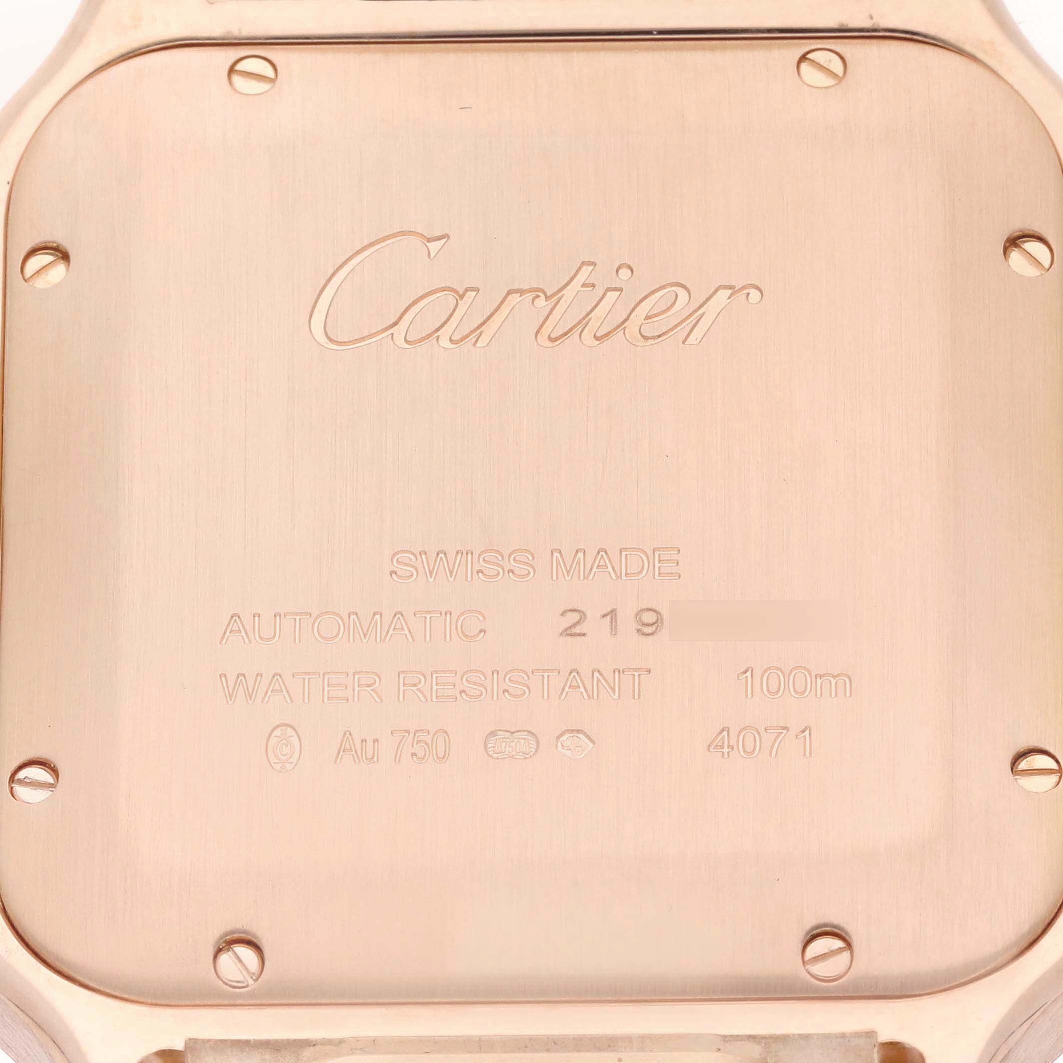 The image shows the back case of a Cartier Santos WGSA0018 Men's Rose Gold Silver Dial watch, highlighting the branding and specifications.