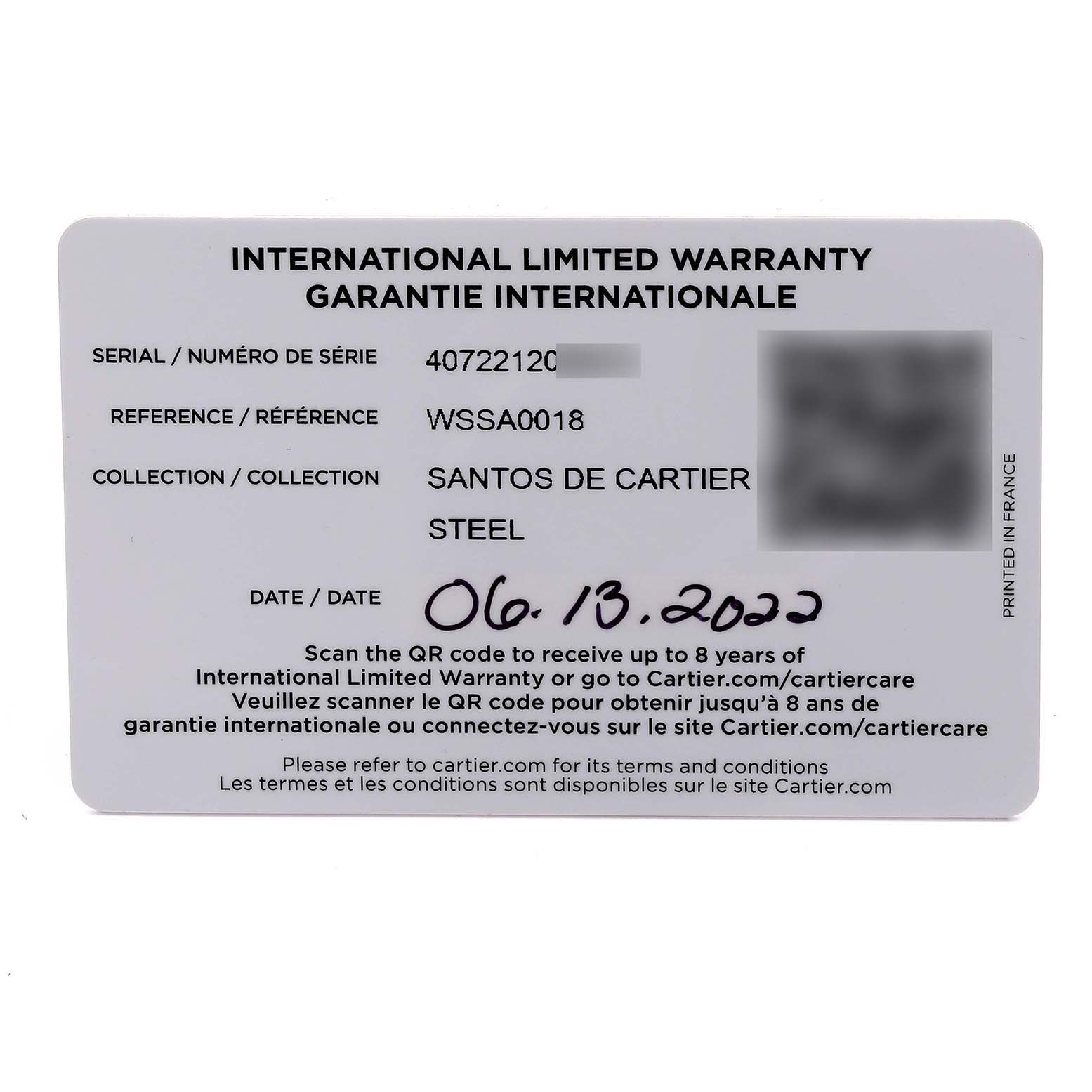 The image shows the warranty card for the Santos de Cartier watch, displaying serial and reference numbers.
