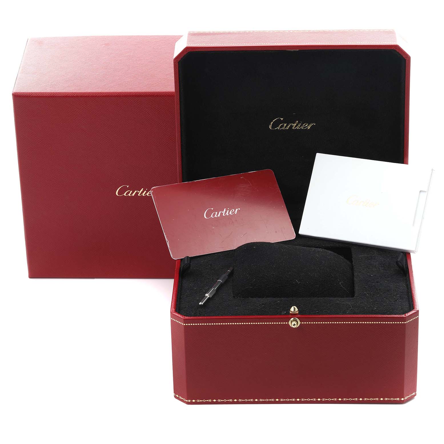 The image shows the packaging and accessories for a Cartier Santos WSSA0018 Men
s Stainless Steel Silver Dial WSSA0018 Men
s Stainless Steel Silver Dial watch, including the box, manual, and screwdriver.