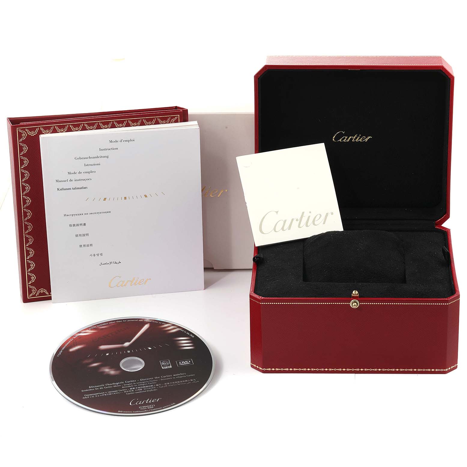 The image shows the packaging, instruction manuals, and a CD for the Cartier Tank Française watch.