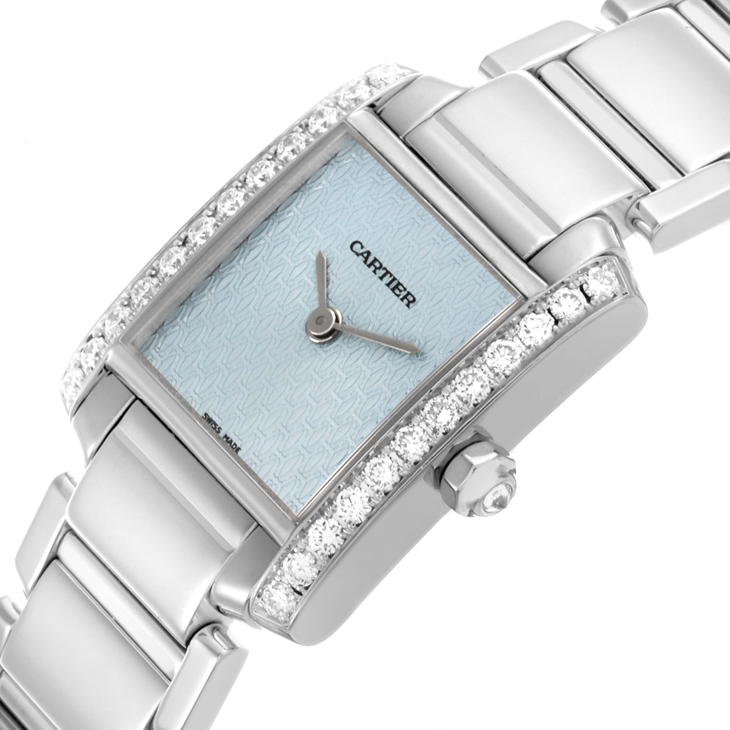 The Cartier Tank Francaise 2403 Women's White Gold Blue Dial 2403 Women's White Gold Blue Dial watch is shown at an angled close-up, highlighting the diamond-set case and links of the bracelet.