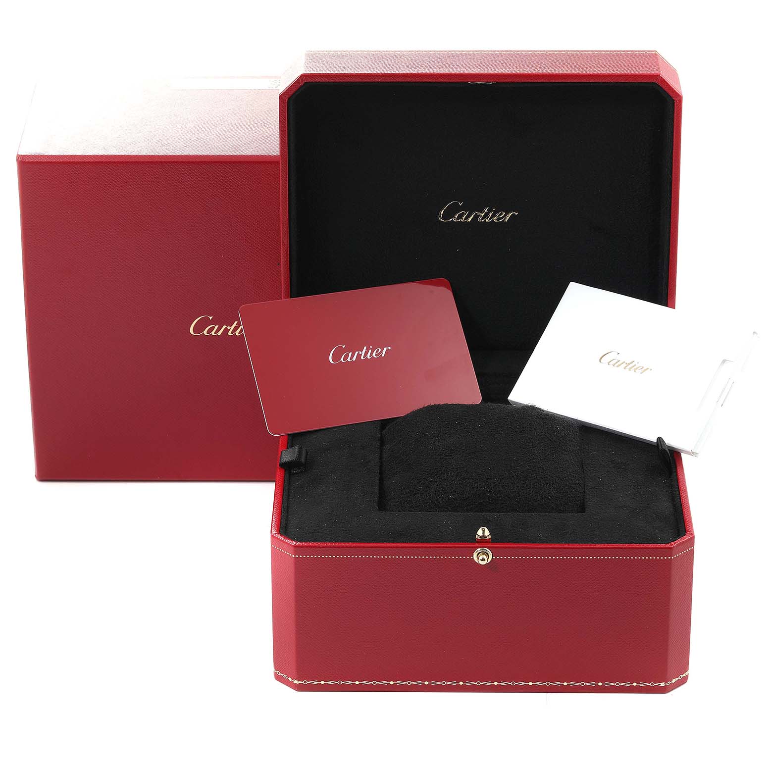 The image shows the packaging and accessories for a Cartier Tank Must WSTA0040 Men
s Stainless Steel Silver Dial WSTA0040 Men
s Stainless Steel Silver Dial watch, including a red box, a cushion, and booklets.