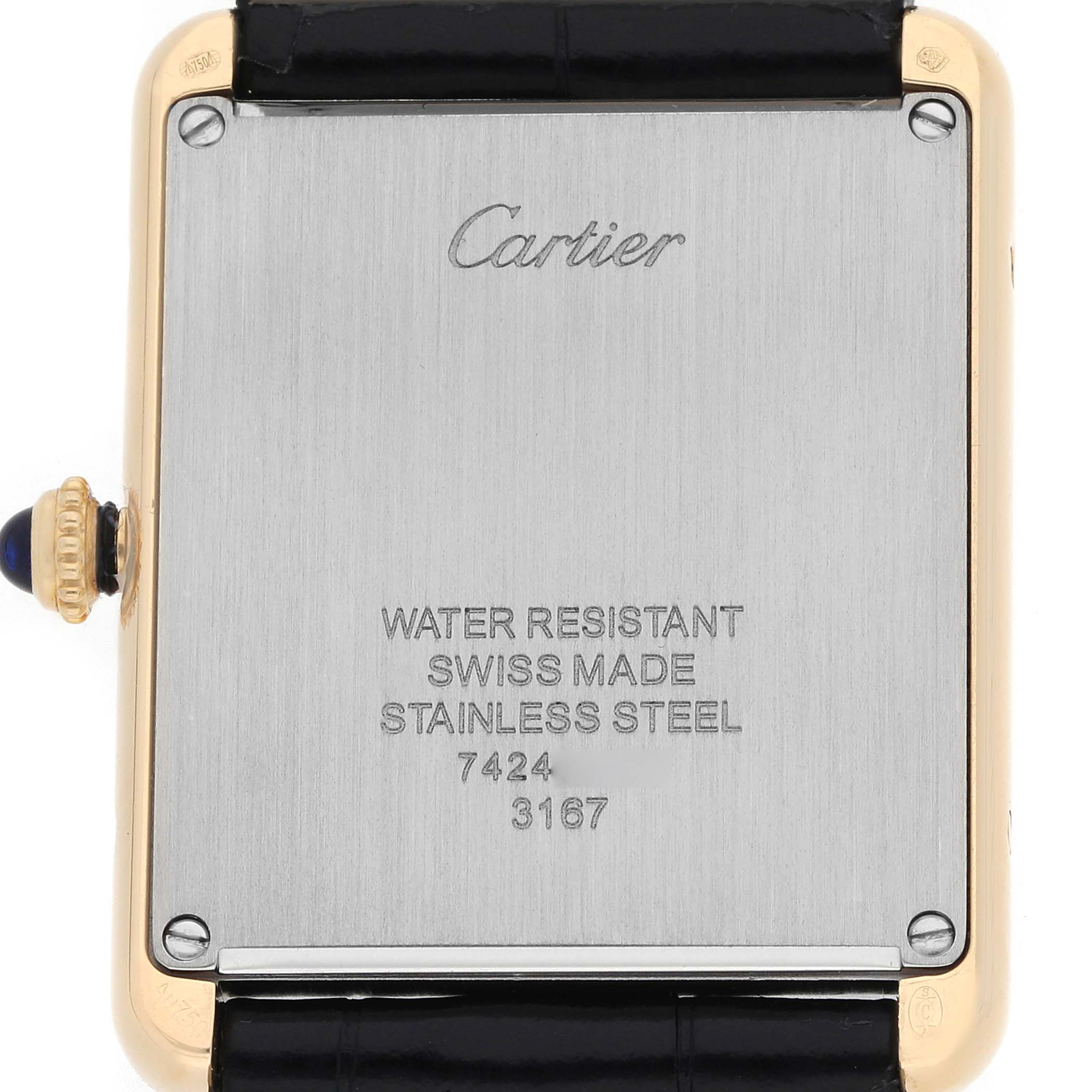 The image shows the back of a Cartier Tank Solo W5200004 Men
s Steel and Gold (two tone) Silver Dial watch, highlighting the case back and crown.