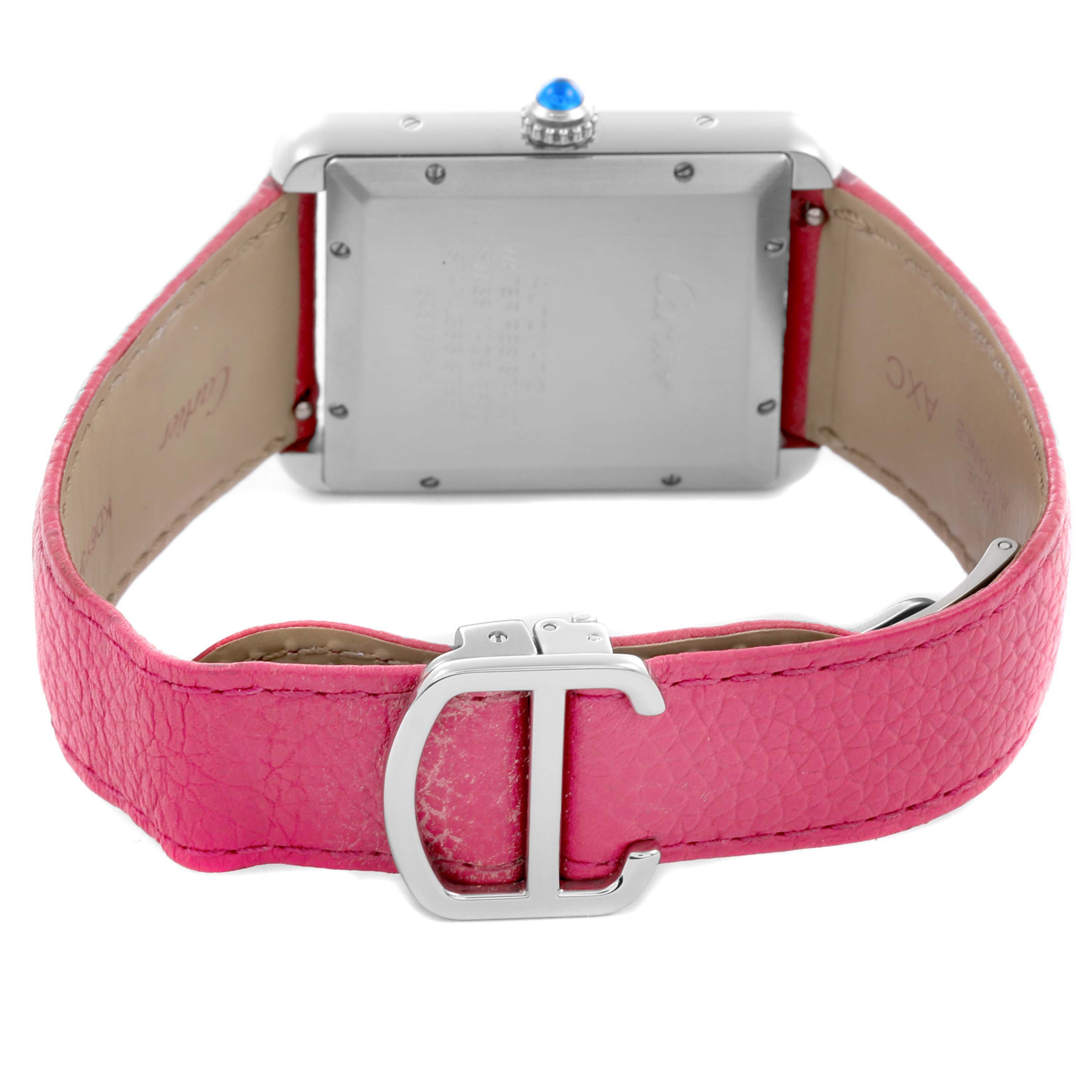 The image shows the back of the Cartier Tank Solo WSTA0029 Men's Stainless Steel Silver Dial WSTA0029 Men's Stainless Steel Silver Dial watch, highlighting the pink strap and clasp.