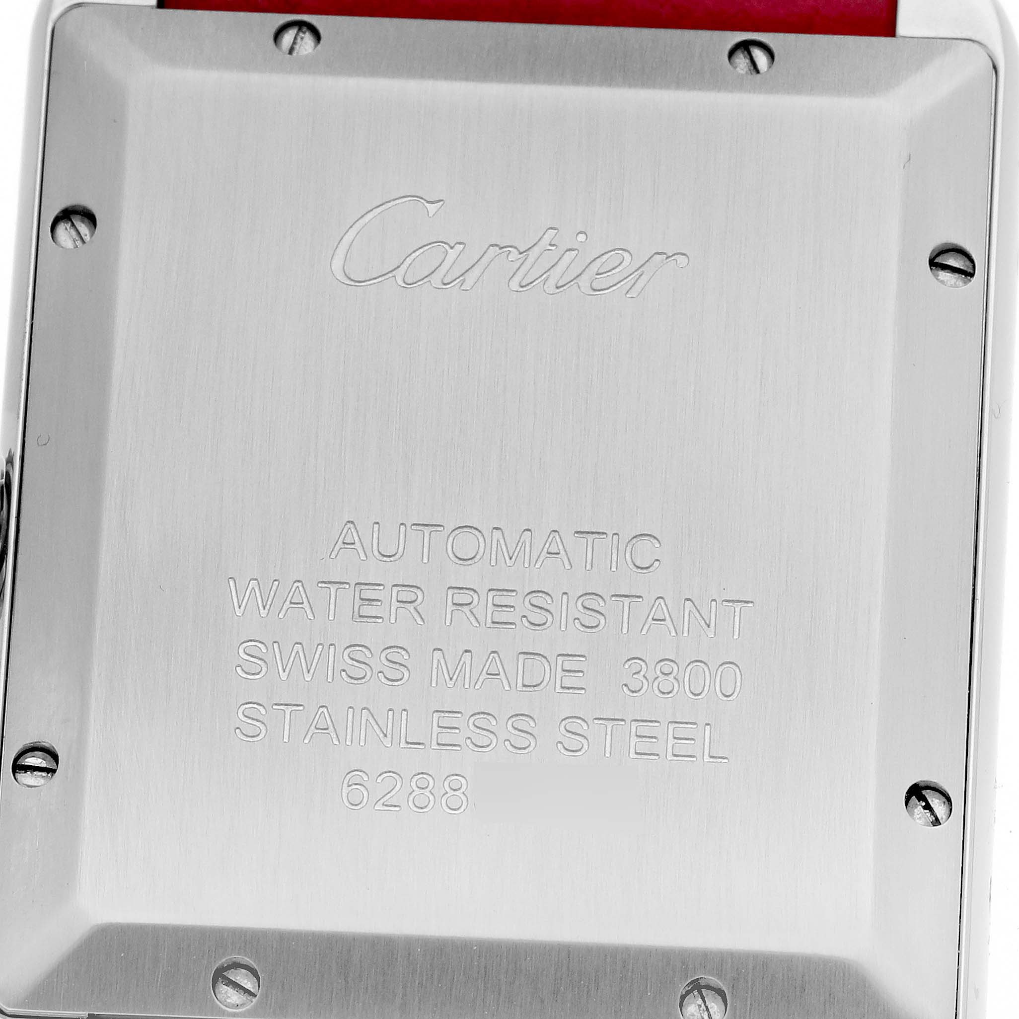 The image shows the back of the Cartier Tank Solo WSTA0029 Men's Stainless Steel Silver Dial WSTA0029 Men's Stainless Steel Silver Dial watch, highlighting its stainless steel case and engravings.