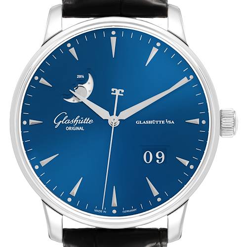 The Glashütte Original watch is shown from the front, highlighting the blue dial, indices, hands, moon phase, and crown.