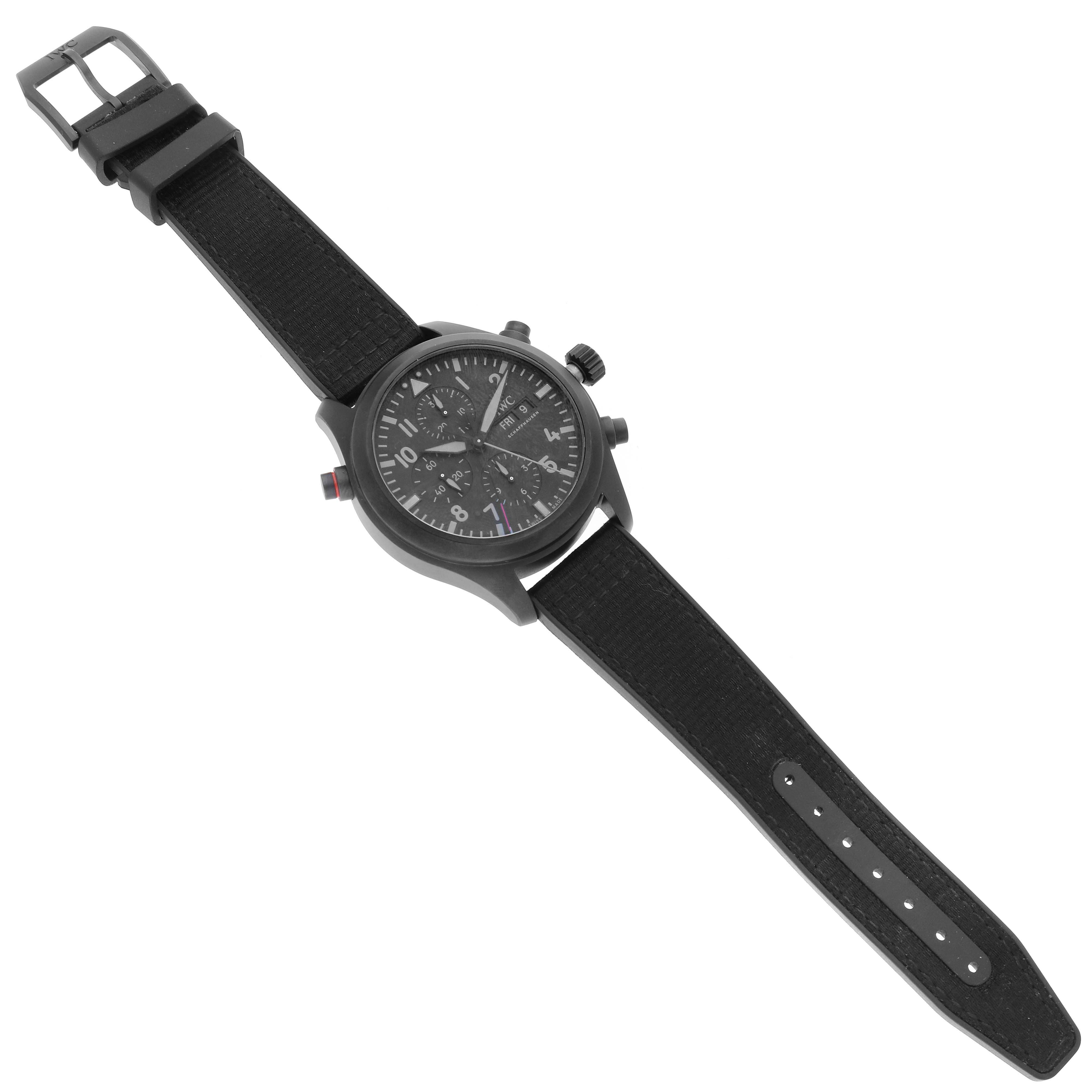 The image shows the IWC Pilot IW371815 Men
s Ceramic Black Dial IW371815 Men
s Ceramic Black Dial watch at a top-down angle, featuring the watch face, case, crown, and black strap.