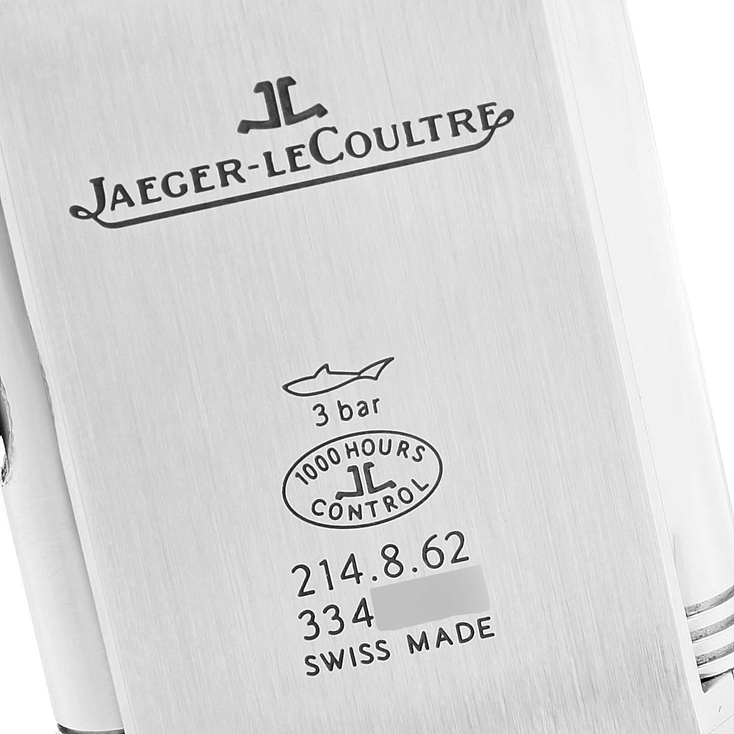 The image shows the engraved case back of a Jaeger-LeCoultre Reverso watch, highlighting the brand logo, model details, and water resistance.