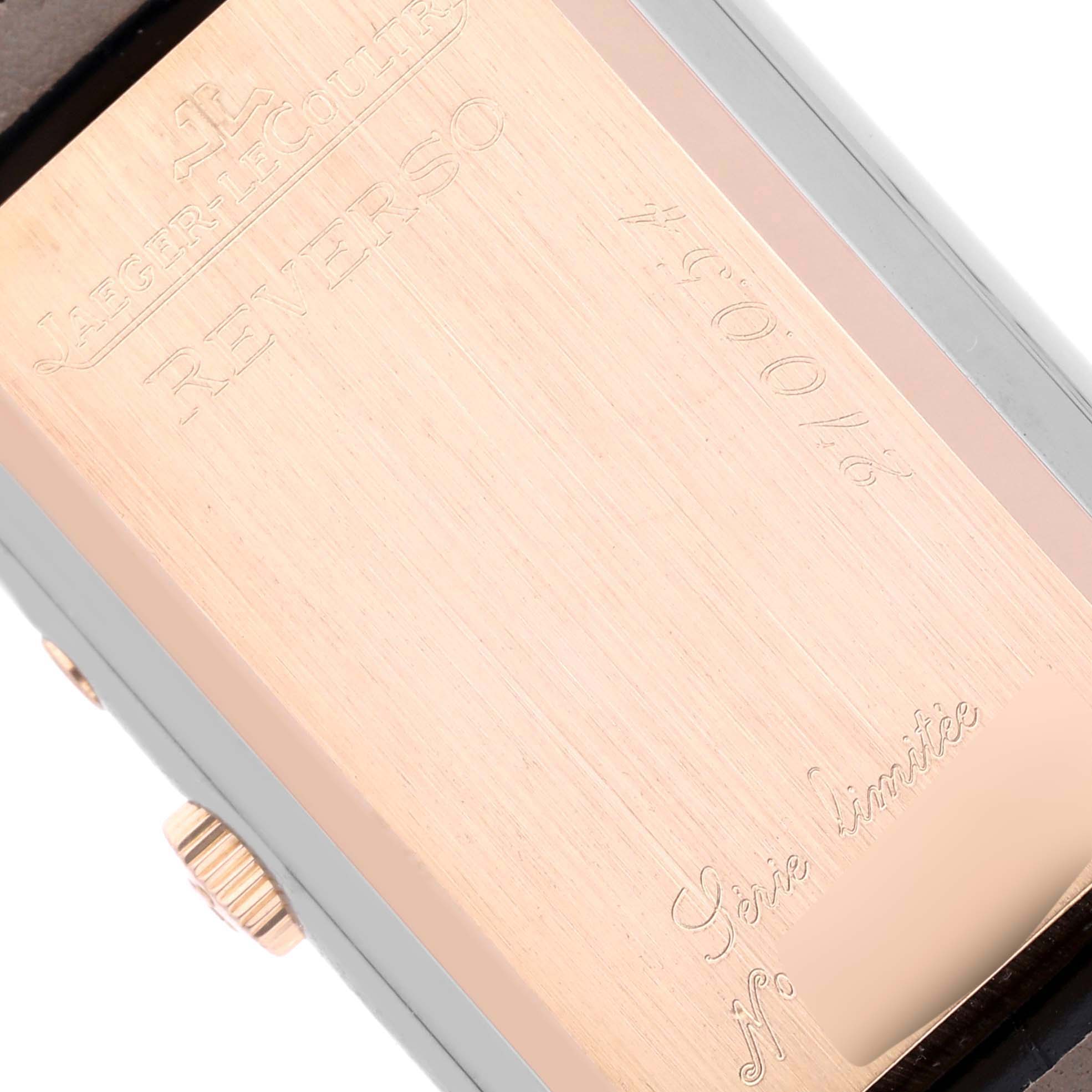 This image shows the back of the Jaeger LeCoultre Reverso 270.0.40 Men's Steel and Gold (two tone) Silver Dial 270.0.40 Men's Steel and Gold (two tone) Silver Dial watch at an angled view, displaying engravings and the case edge.