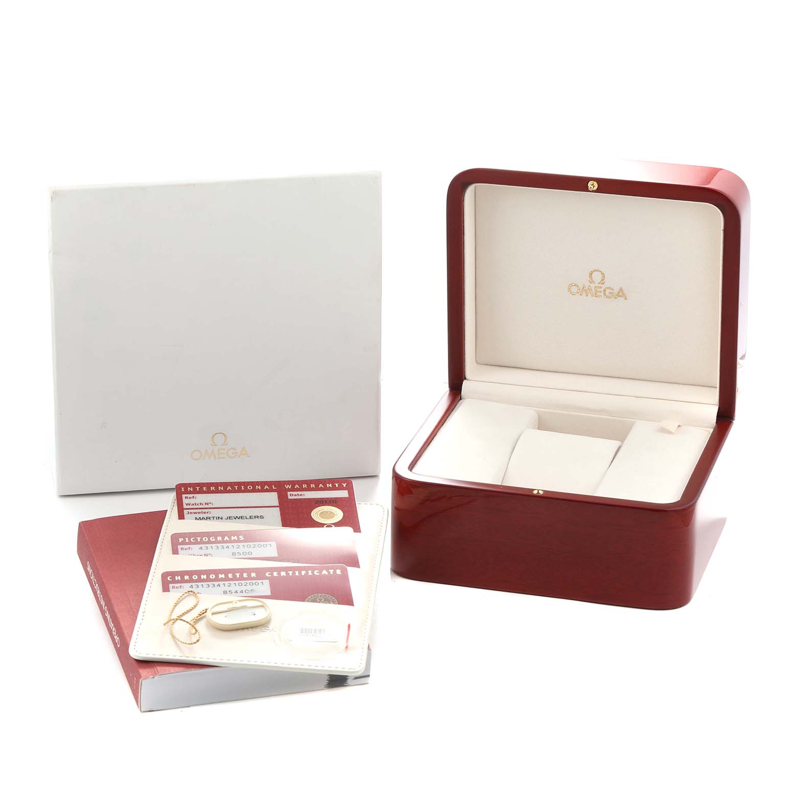 The image shows an Omega De Ville 431.33.41.21.02.001 Men
s Stainless Steel Silver Dial watch box, documentation, and warranty cards from a frontal angle.