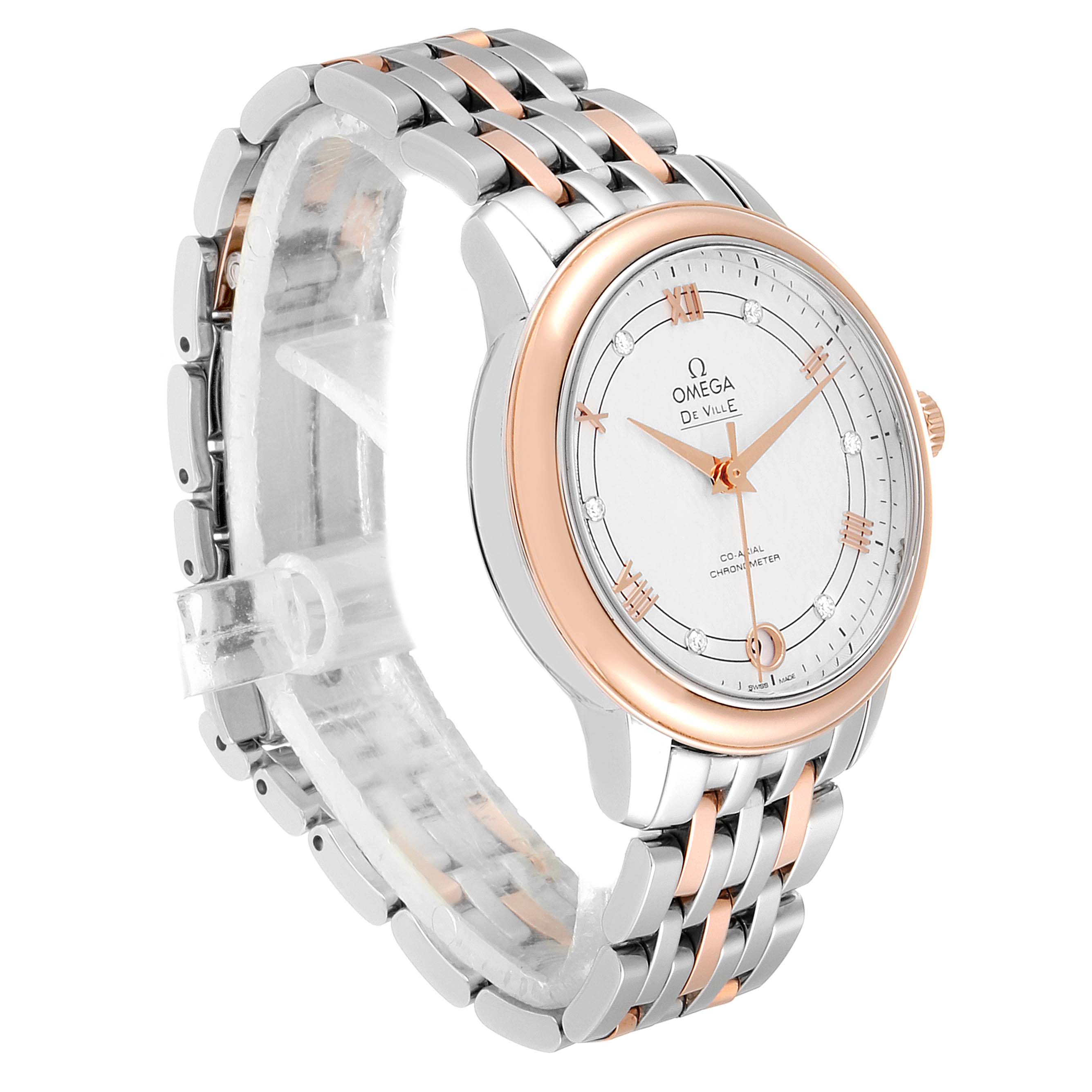 The Omega 424.20.33.20.52.003 Women's Rose Gold Silver Dial 424.20.33.20.52.003 Women's Rose Gold Silver Dial DeVille Prestige Steel Rose Gold Diamond watch (model 424.20.33.20.52.003) is displayed at an angle showcasing the front dial and the metal band.