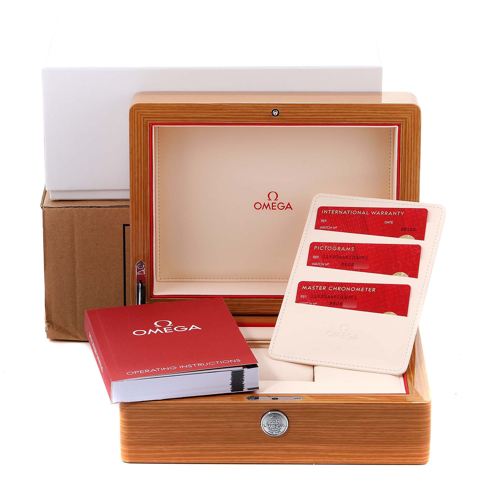 The image shows the packaging, international warranty cards, operating instructions, and box for the Omega Planet Ocean 215.30.46.51.03.001 Men
s Stainless Steel Blue Dial 215.30.46.51.03.001 Men
s Stainless Steel Blue Dial model watch.