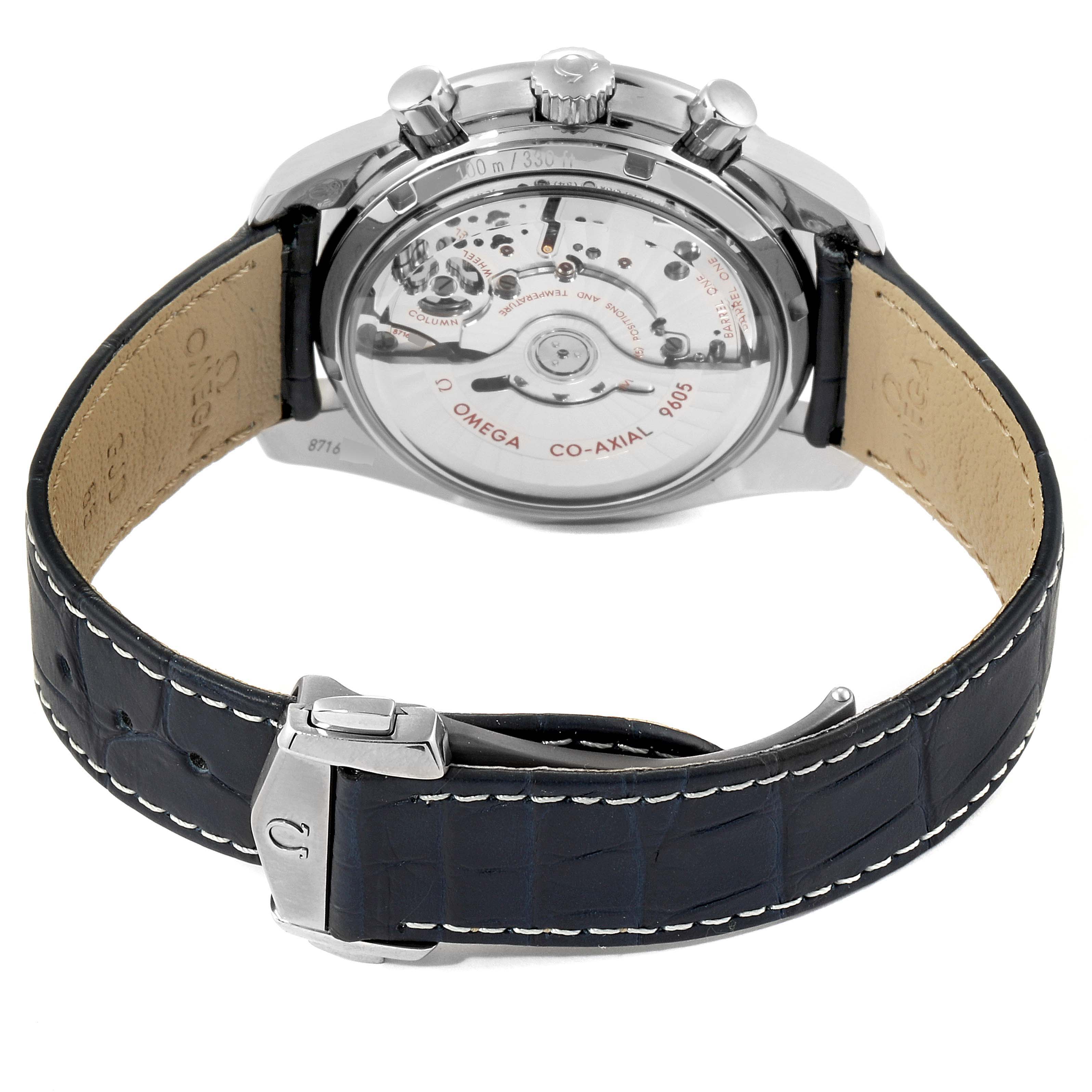 The image shows the back view of an Omega Speedmaster 311.93.44.51.03.001 Men's Stainless Steel Blue Dial 311.93.44.51.03.001 Men's Stainless Steel Blue Dial watch, highlighting its transparent case back and the leather strap with a clasp.